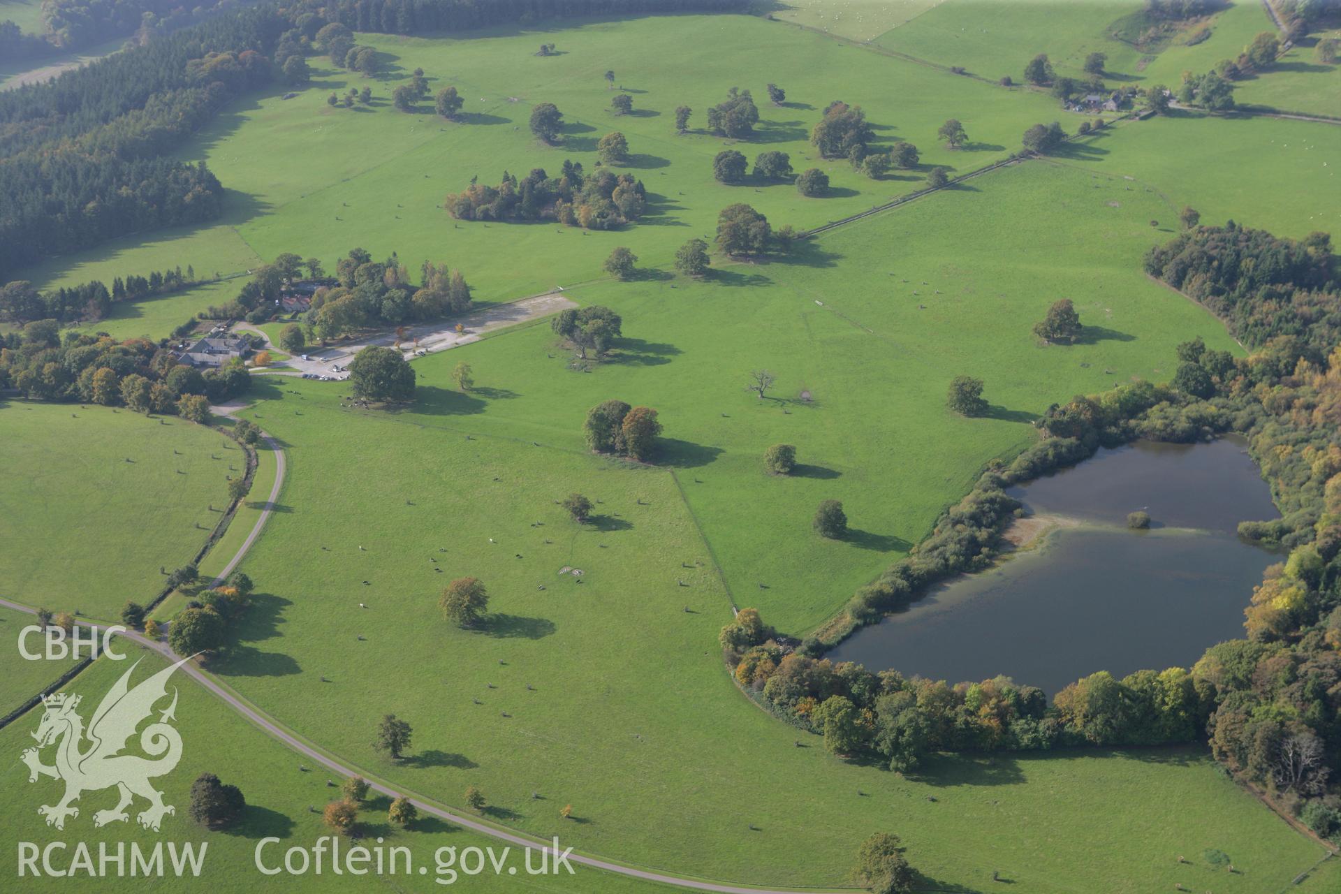 RCAHMW colour oblique aerial photograph of a section of Offa's Dyke in Chirk Park extending 340m northeast of Home Farm. Taken on 13 October 2009 by Toby Driver