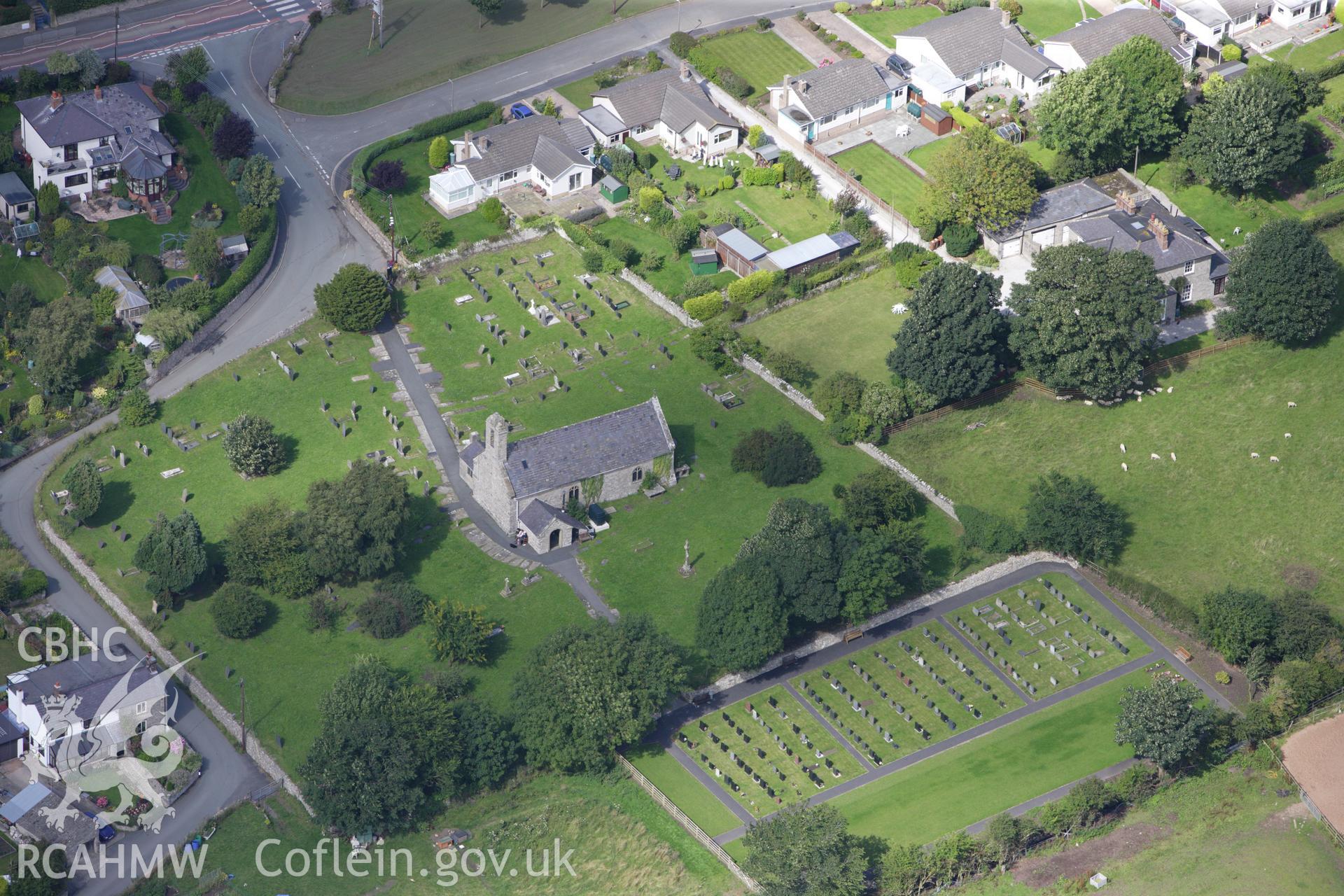 RCAHMW colour oblique aerial photograph of Trelawnyd Churchyard Cross. Taken on 30 July 2009 by Toby Driver