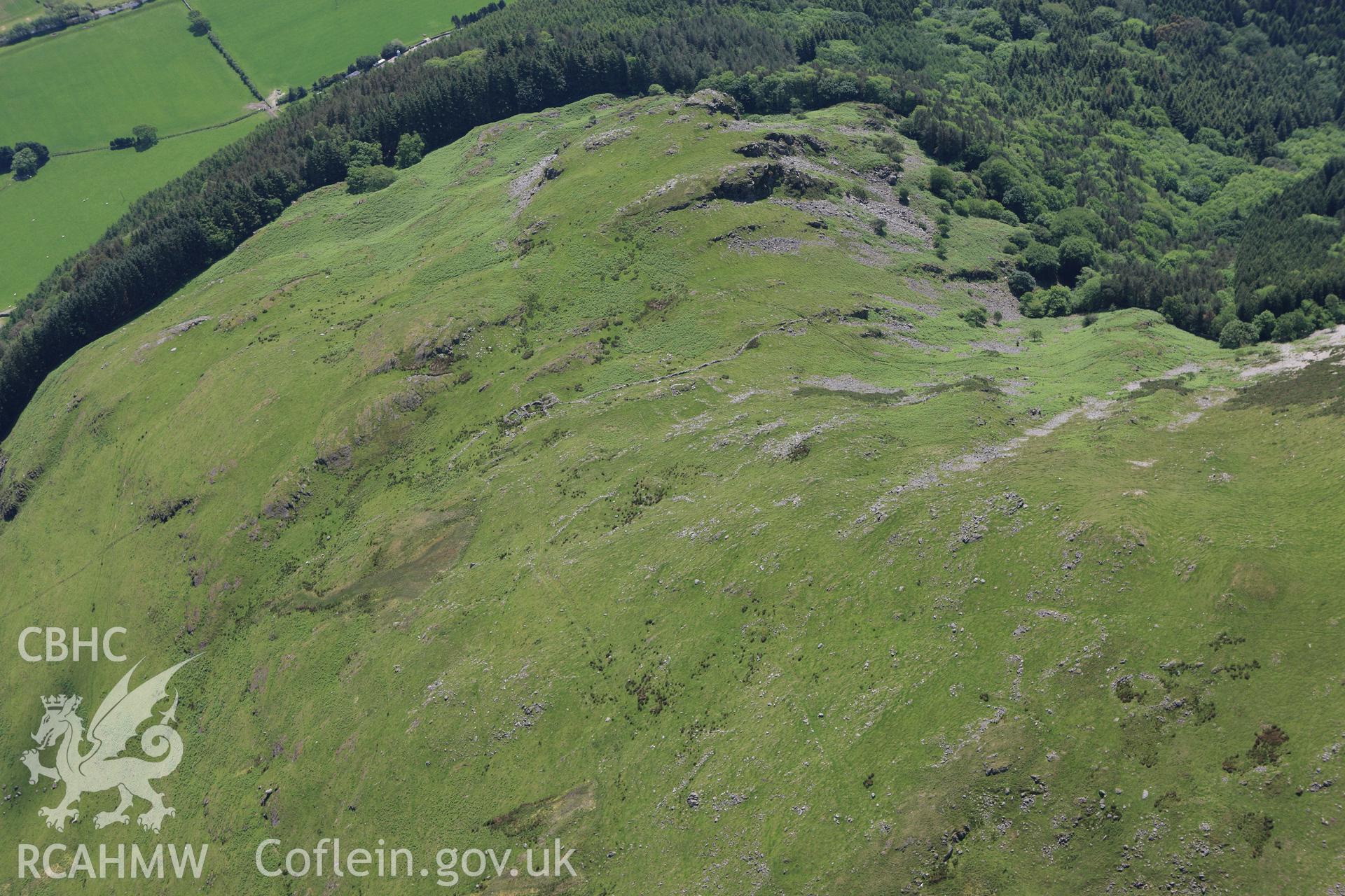 RCAHMW colour oblique aerial photograph of Craig Tyn-y-Cornel Settlement. Taken on 02 June 2009 by Toby Driver