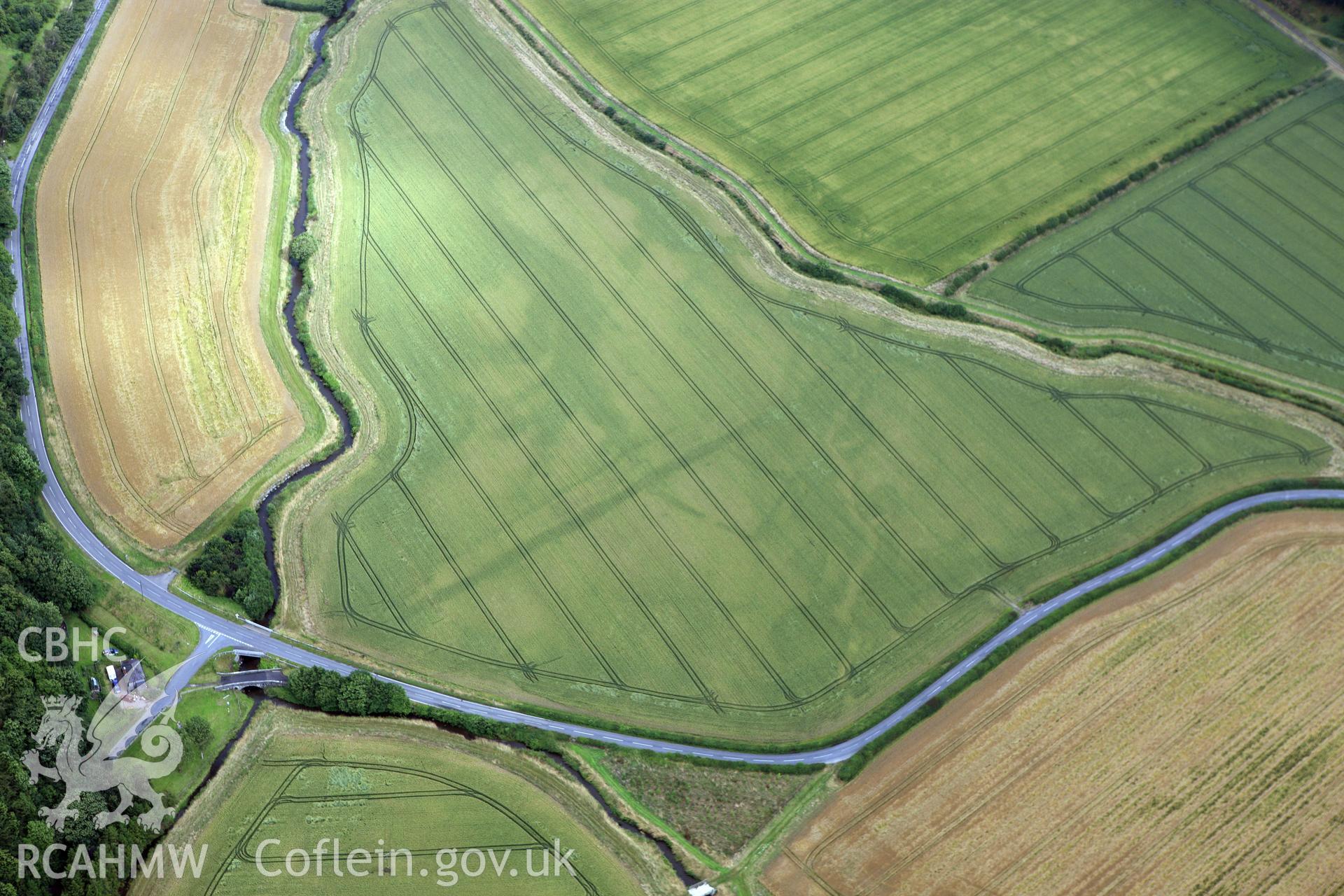 RCAHMW colour oblique aerial photograph of Ditchyeld Bridge Defended Enclosure. Taken on 23 July 2009 by Toby Driver