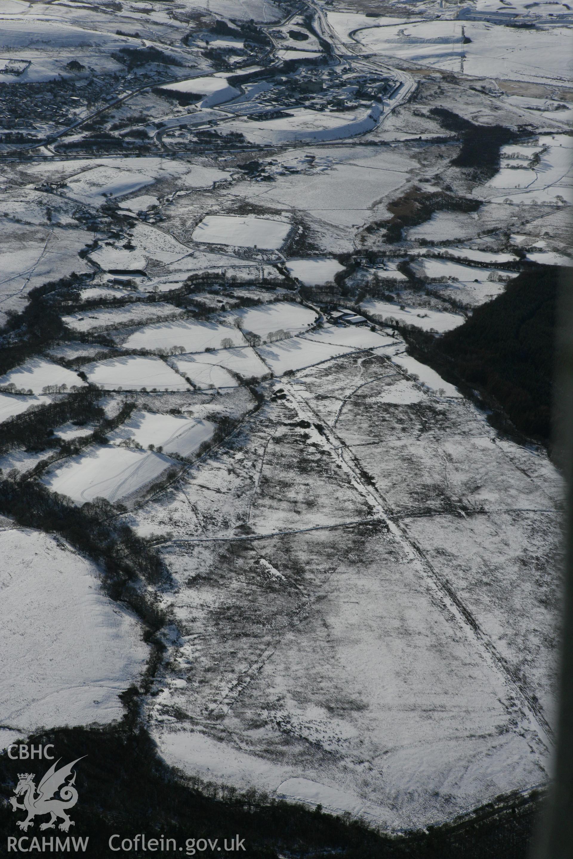 RCAHMW colour oblique photograph of Coelbren Roman fort. Taken by Toby Driver on 06/02/2009.