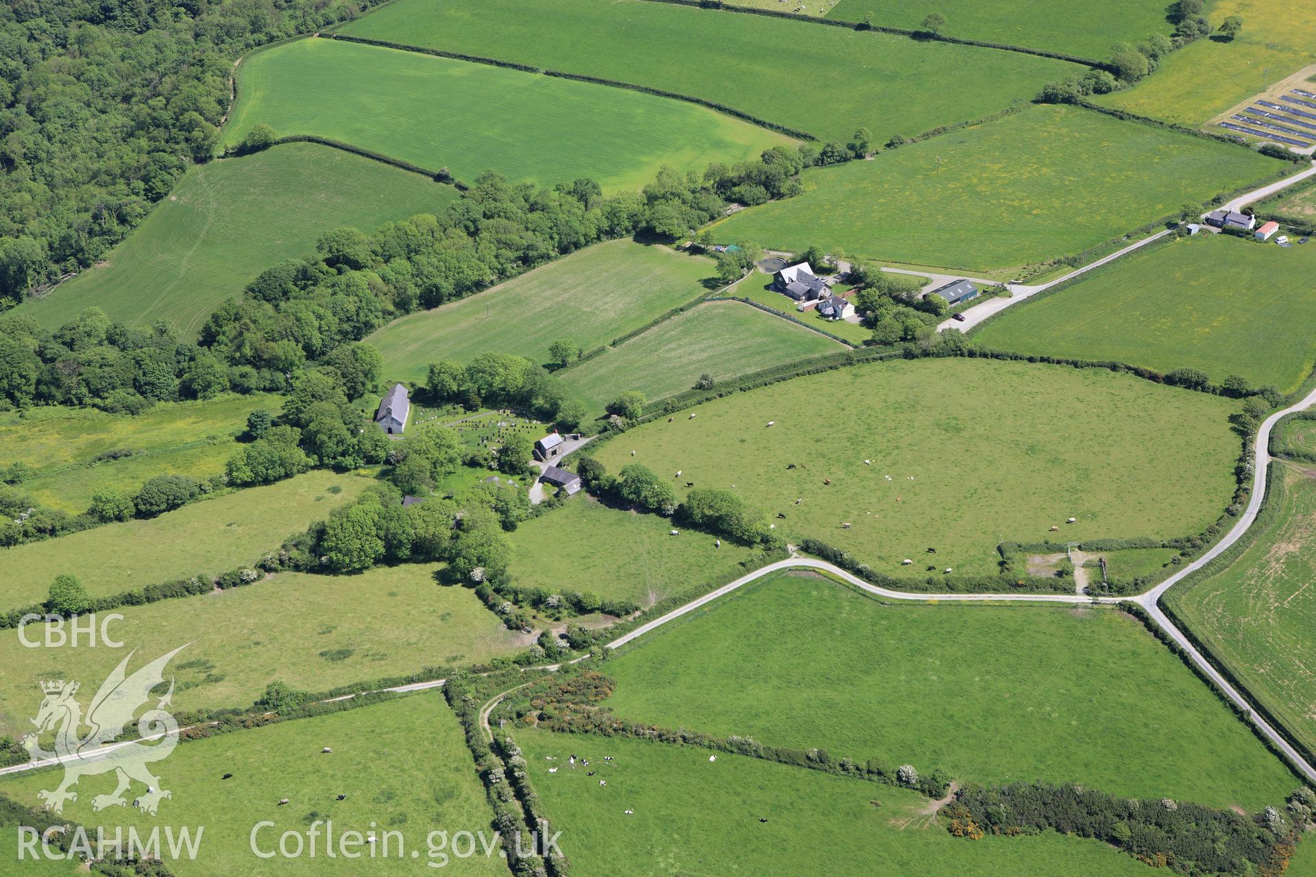 RCAHMW colour oblique aerial photograph of St. Tysilio's Church, near Nanternis, Llandysiliogogo. Taken on 01 June 2009 by Toby Driver