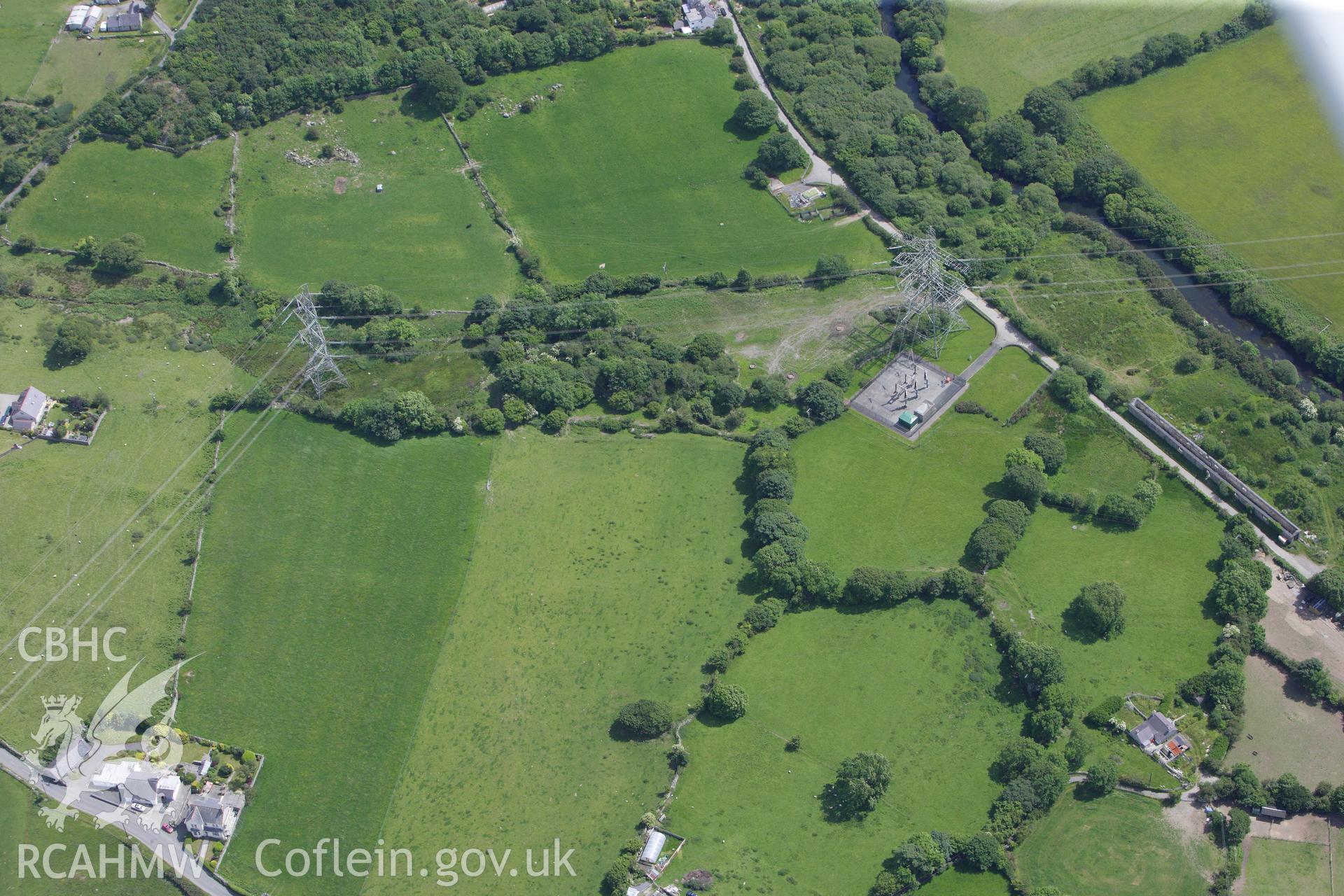 RCAHMW colour oblique aerial photograph of the Tan-y-Coed Hut Group. Taken on 16 June 2009 by Toby Driver