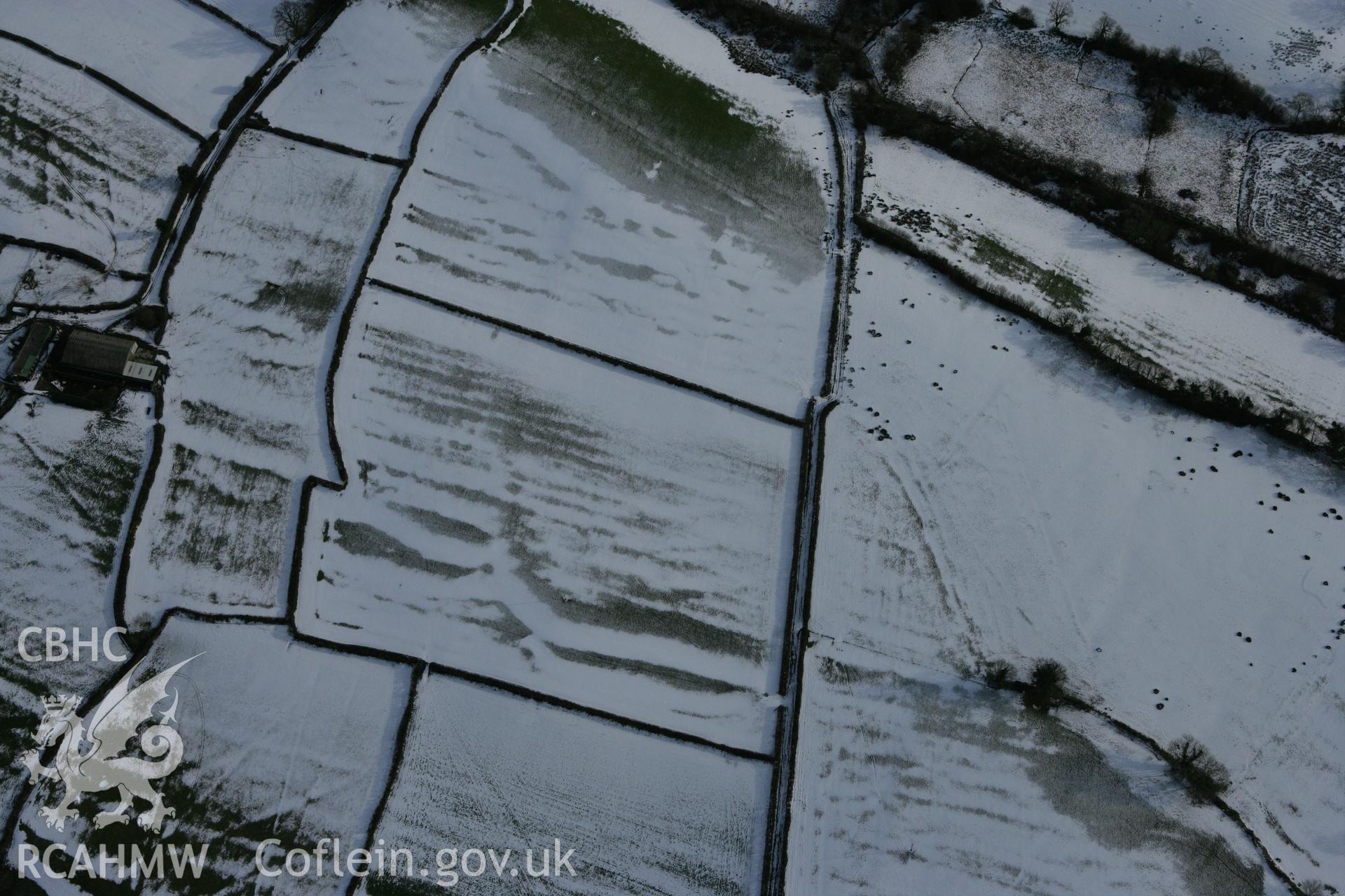 RCAHMW colour oblique photograph of Sythfaen Llwyn Du standing stone. Taken by Toby Driver on 06/02/2009.