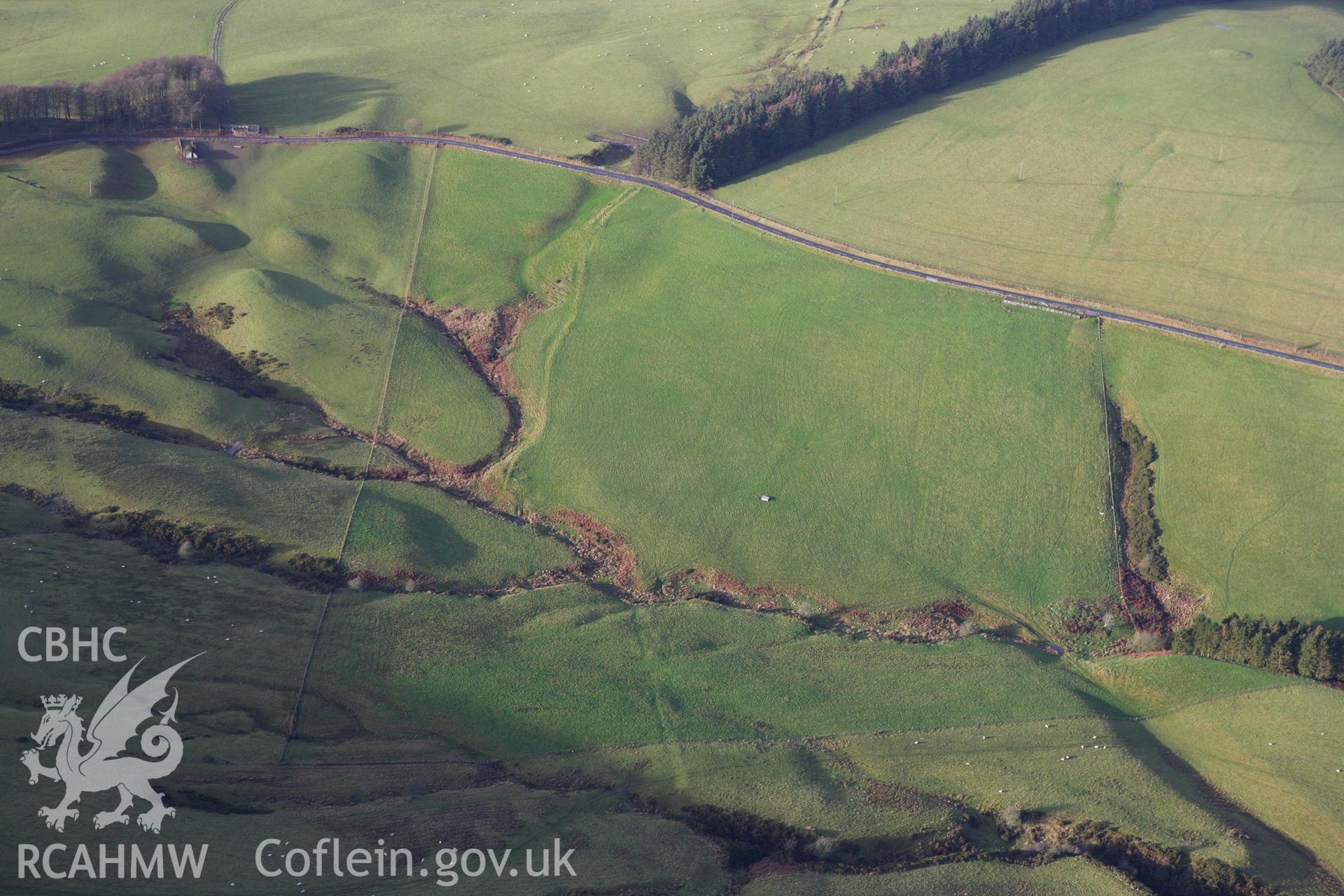 RCAHMW colour oblique aerial photograph of Double Ditches Dyke, Kerry. Taken on 10 December 2009 by Toby Driver