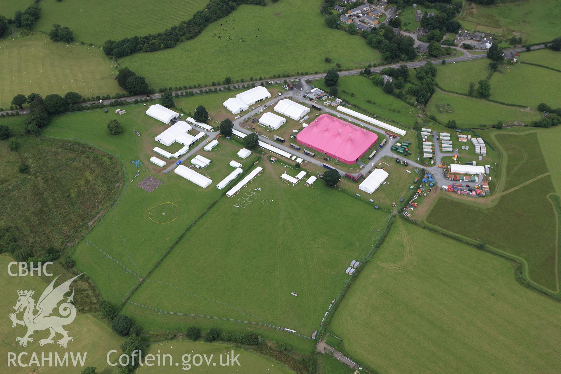 RCAHMW colour oblique aerial photograph of the site of the Eistedddfod at Bala in 1997 and 2009. Taken on 08 July 2009 by Toby Driver