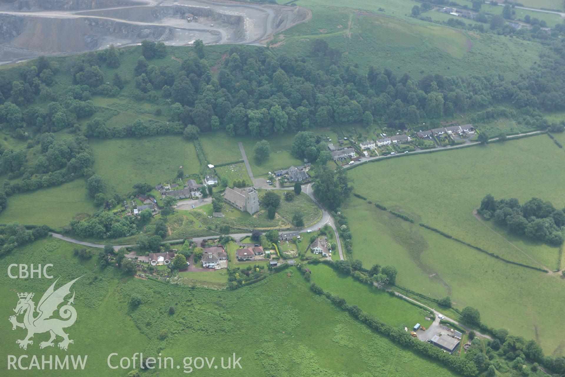 RCAHMW colour oblique aerial photograph of Old Radnor Castle showing village and ringwork. Taken on 29 June 2009 by Toby Driver