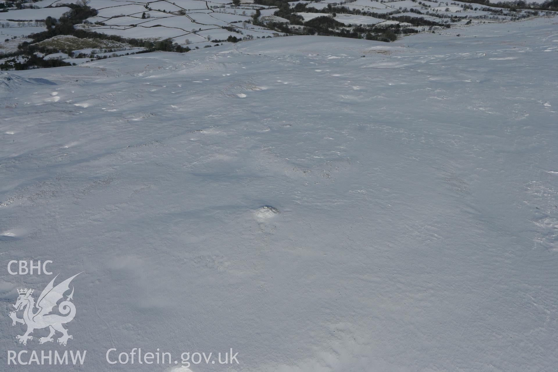 RCAHMW colour oblique photograph of Carn Pen-y-Clogau. Taken by Toby Driver on 06/02/2009.