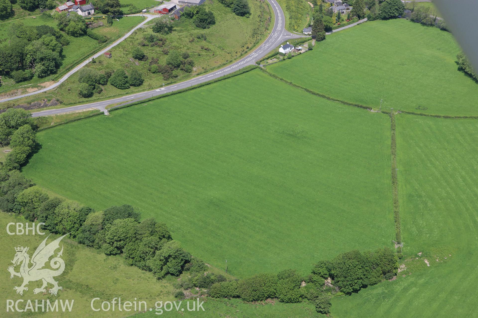 RCAHMW colour oblique aerial photograph of Fridd Round Barrows, Afon Dulas. Taken on 02 June 2009 by Toby Driver