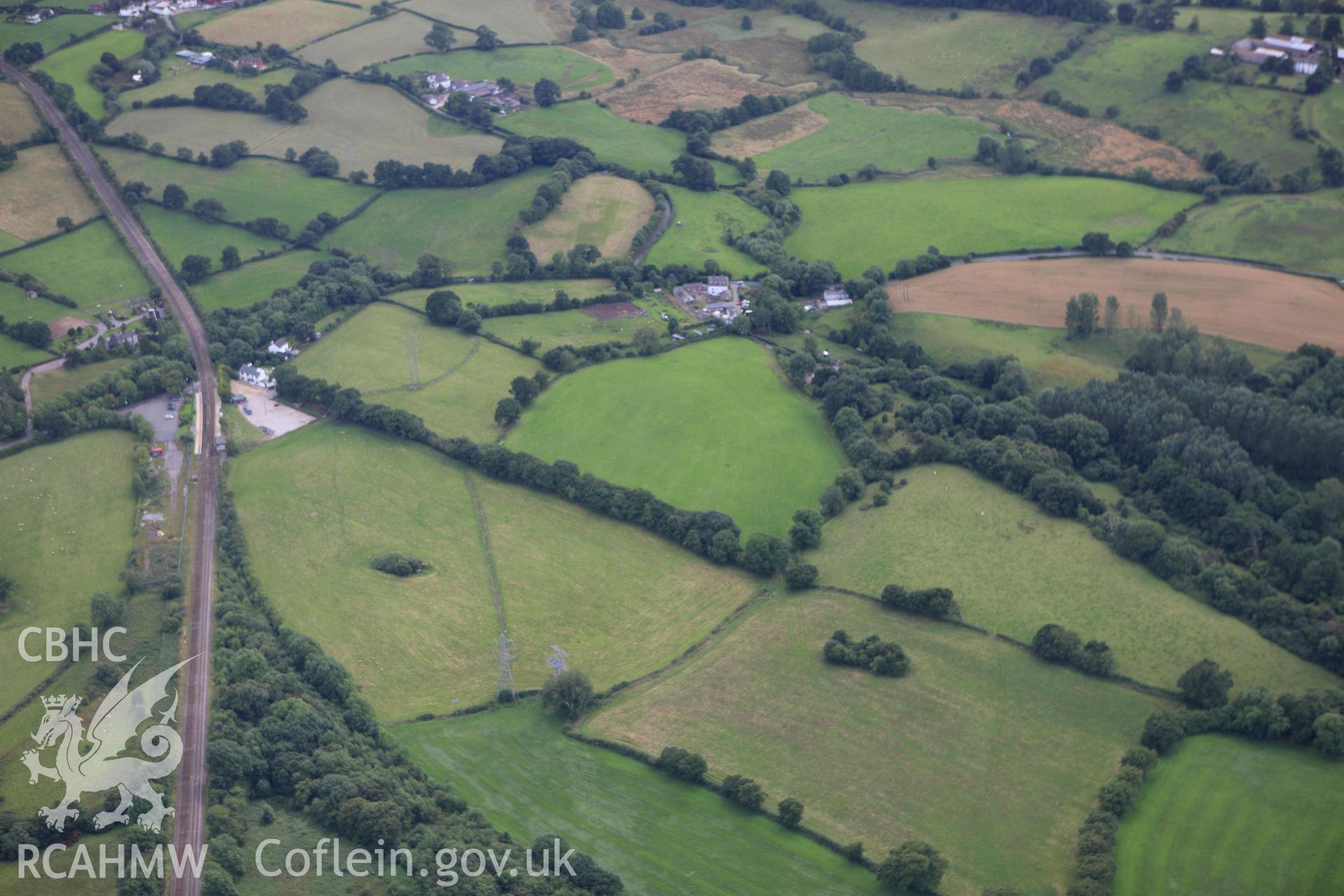 RCAHMW colour oblique aerial photograph of Wat's Dyke west of Rhos-y-Brwyner. Taken on 30 July 2009 by Toby Driver