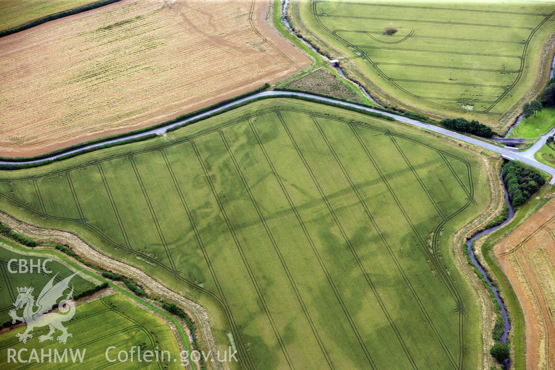 RCAHMW colour oblique aerial photograph of Ditchyeld Bridge Defended Enclosure. Taken on 23 July 2009 by Toby Driver