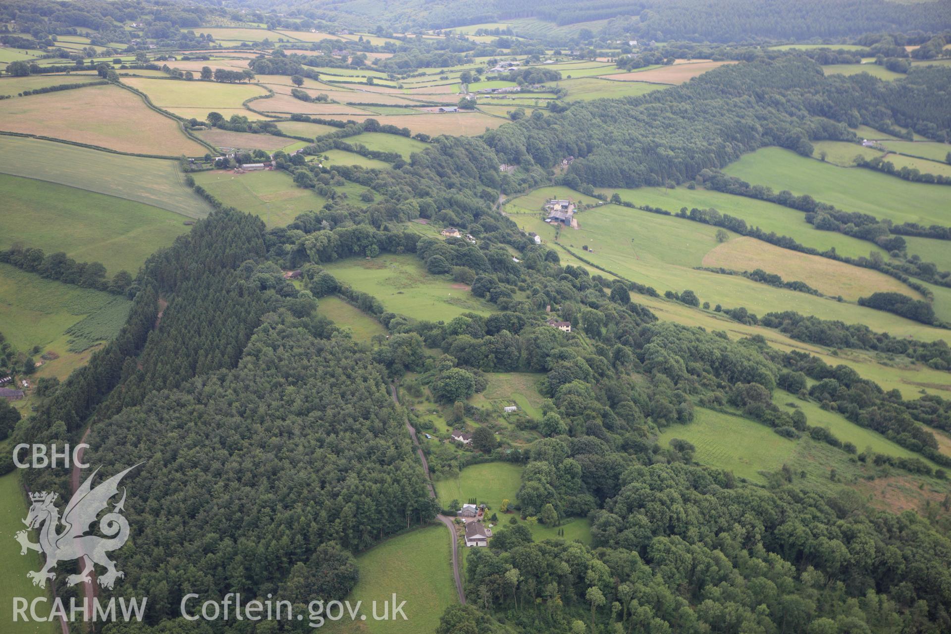 RCAHMW colour oblique aerial photograph of Gaer-Fawr Hillfort. Taken on 09 July 2009 by Toby Driver