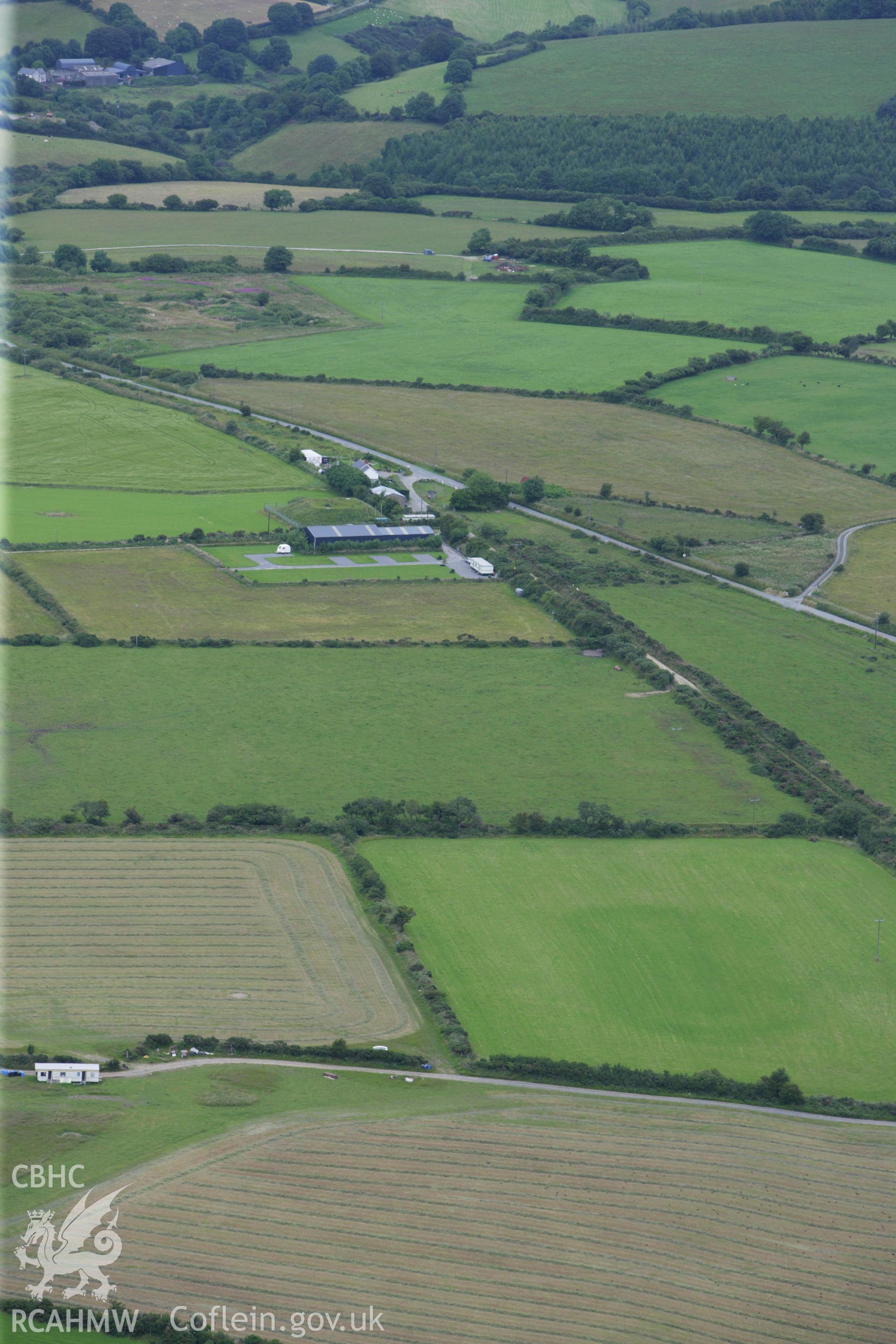 RCAHMW colour oblique aerial photograph of Maen Gwyn Hir. Taken on 09 July 2009 by Toby Driver