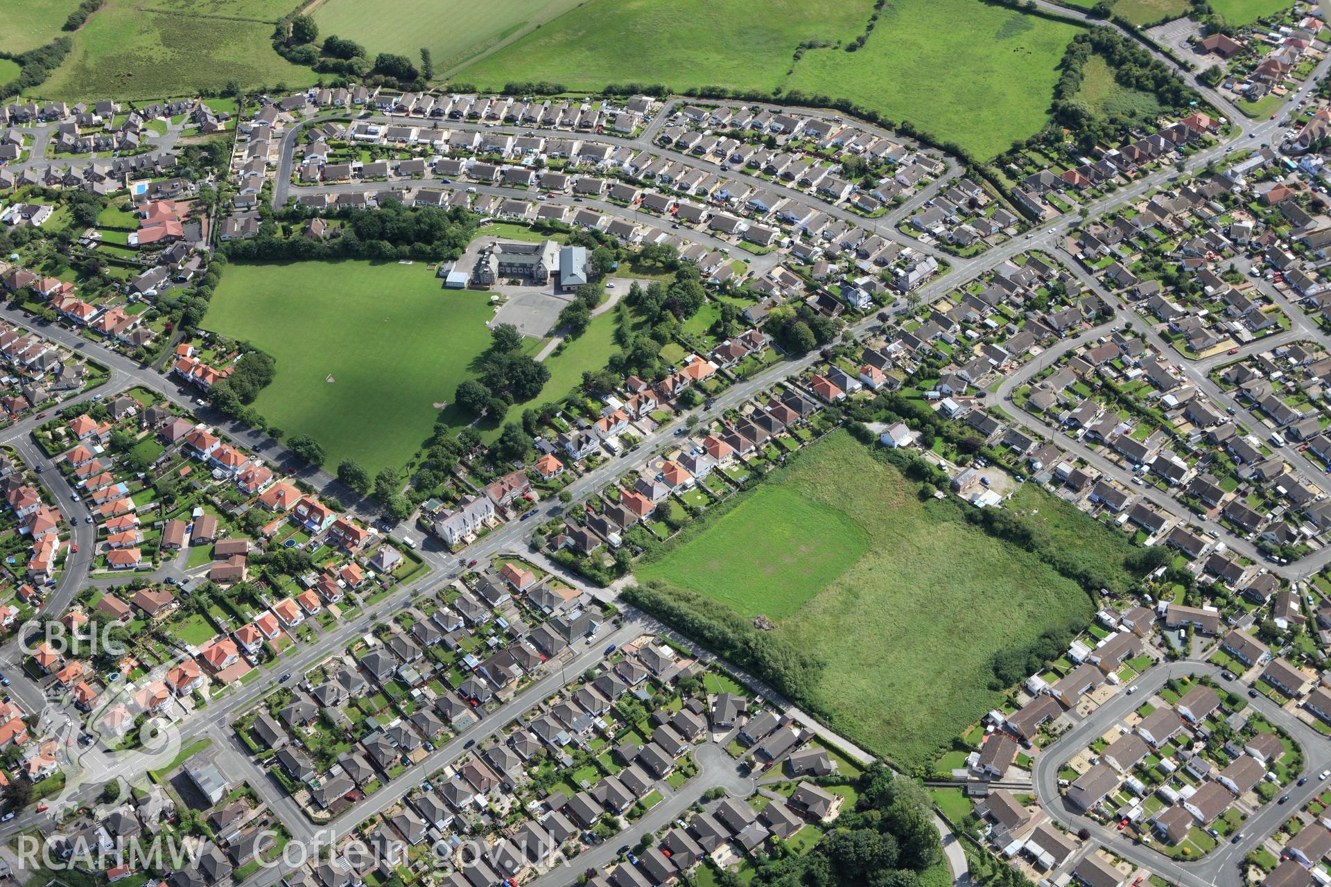 RCAHMW colour oblique aerial photograph of Prestatyn Roman Site. Taken on 30 July 2009 by Toby Driver