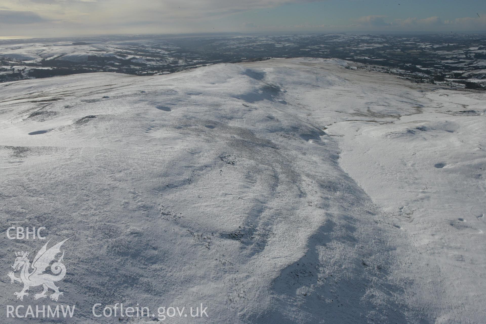 RCAHMW colour oblique photograph of Tair Carn Isaf, cairns., looking south. Taken by Toby Driver on 06/02/2009.