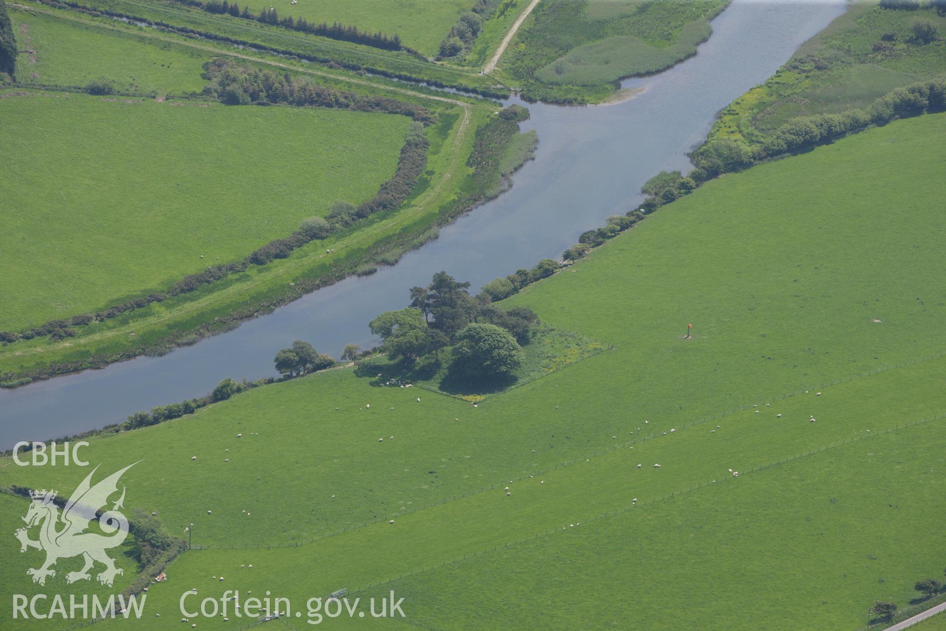 RCAHMW colour oblique aerial photograph of Talybont Castle Mound. Taken on 02 June 2009 by Toby Driver