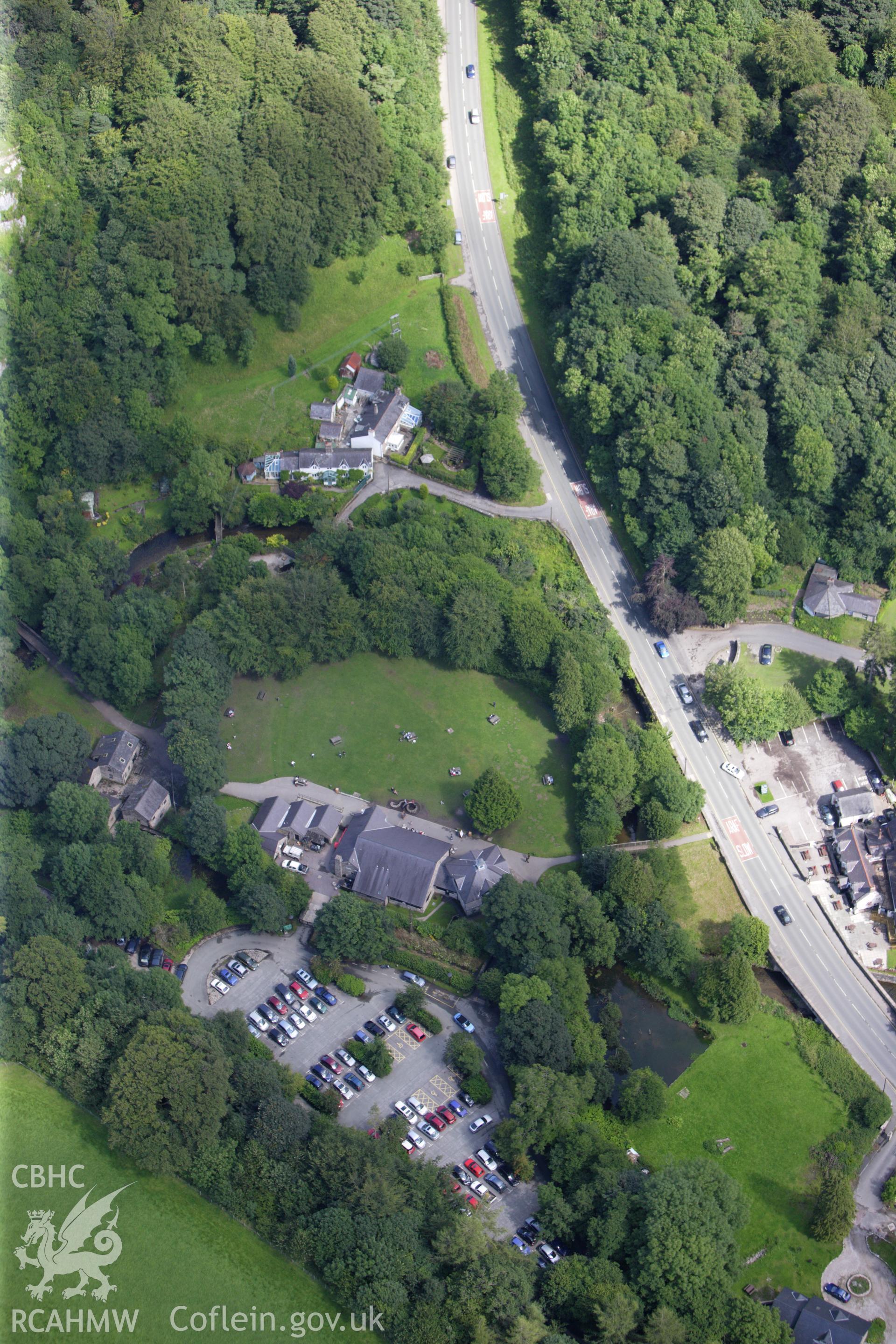 RCAHMW colour oblique aerial photograph of Loggerheads Country Park Visitor Centre. Taken on 30 July 2009 by Toby Driver