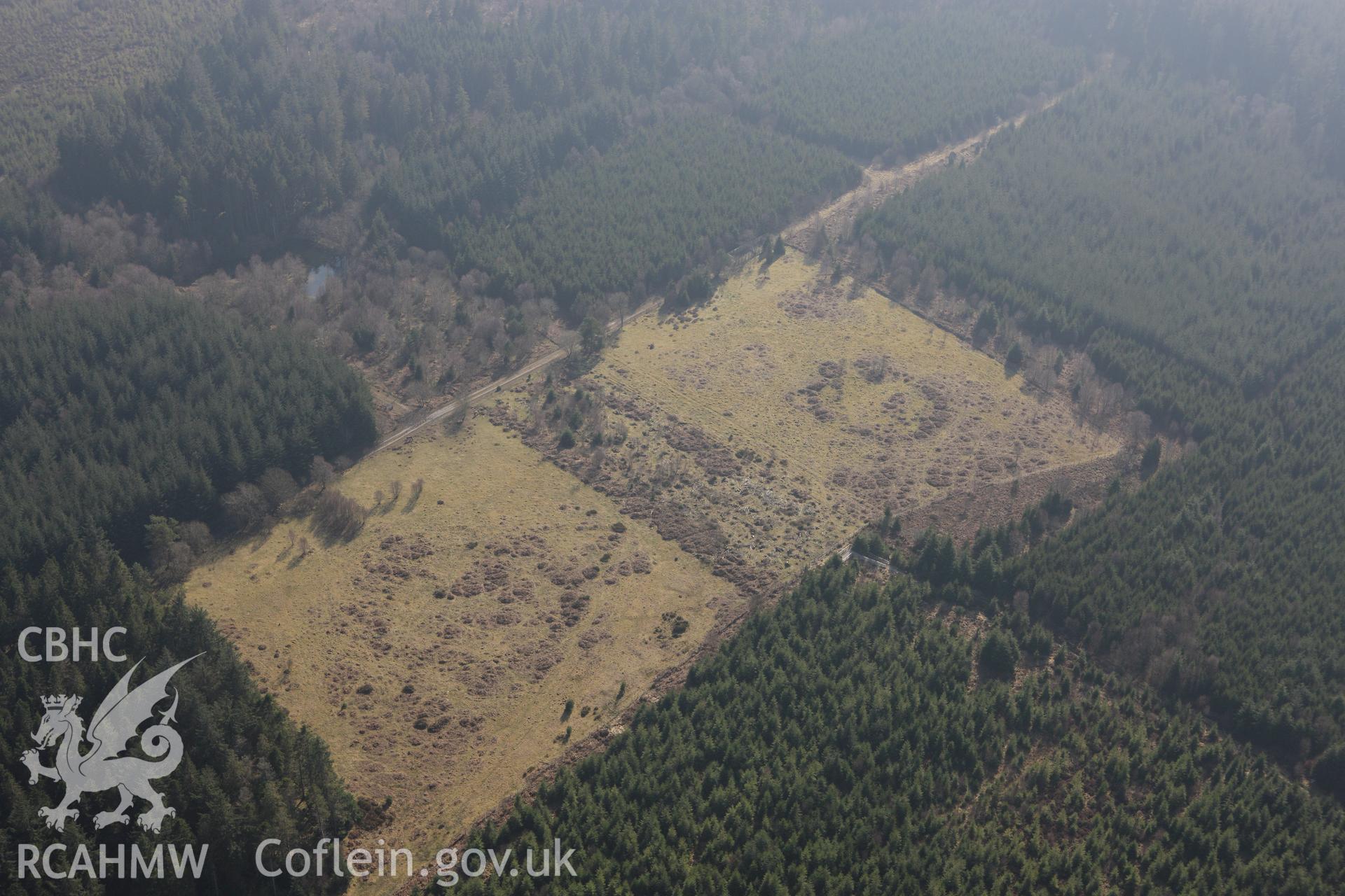 RCAHMW colour oblique photograph of Caerau circles;Pont Petryal Caerau circles. Taken by Toby Driver on 18/03/2009.