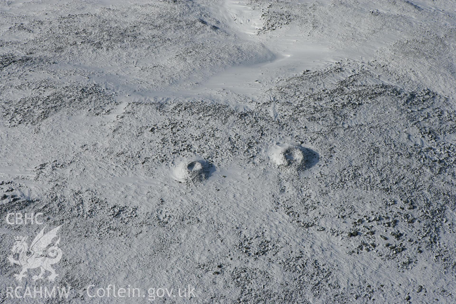 RCAHMW colour oblique photograph of Carnau'r Garreg Las cairns. Taken by Toby Driver on 06/02/2009.