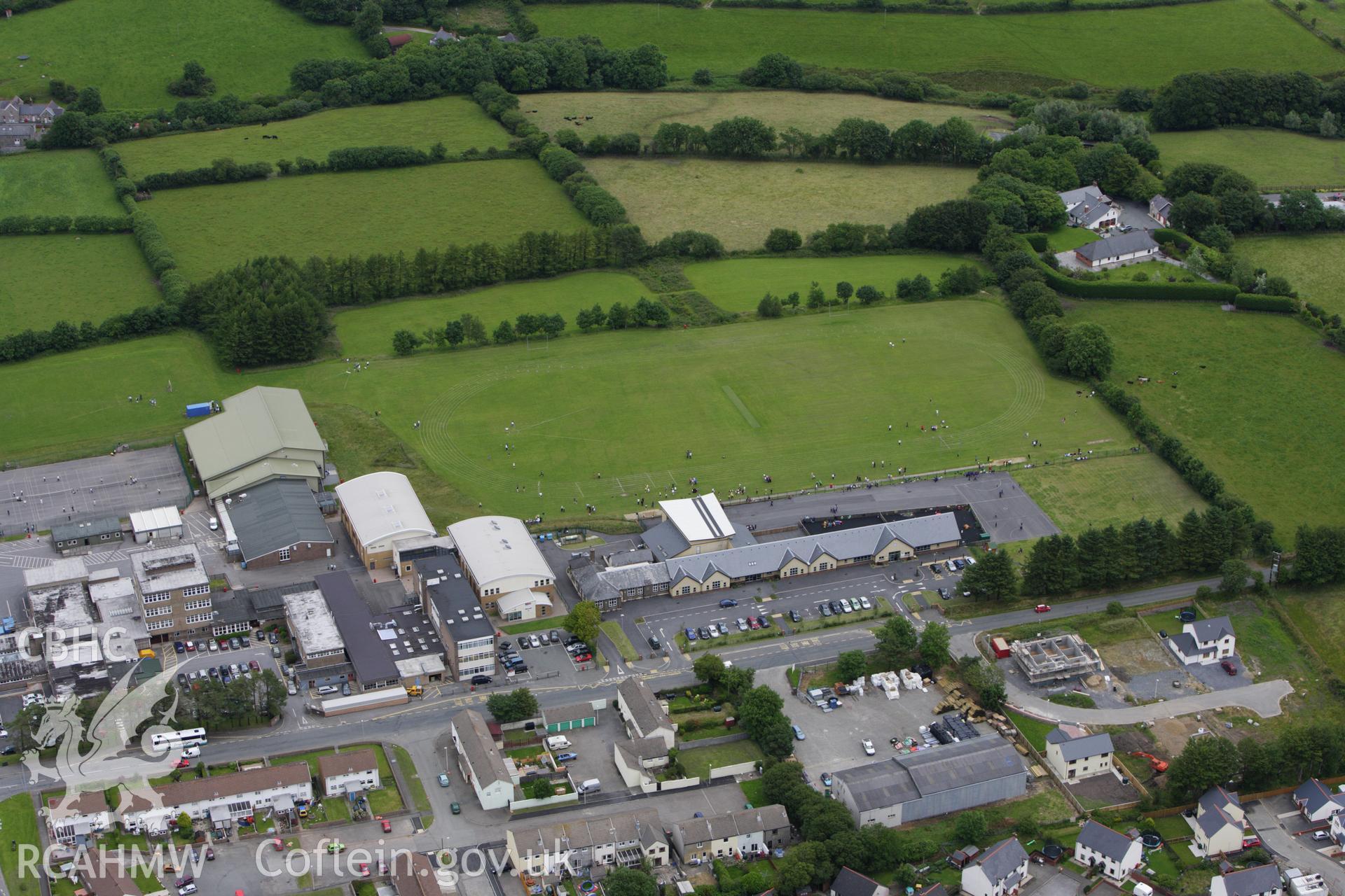 RCAHMW colour oblique aerial photograph of Crymych School. Taken on 09 July 2009 by Toby Driver