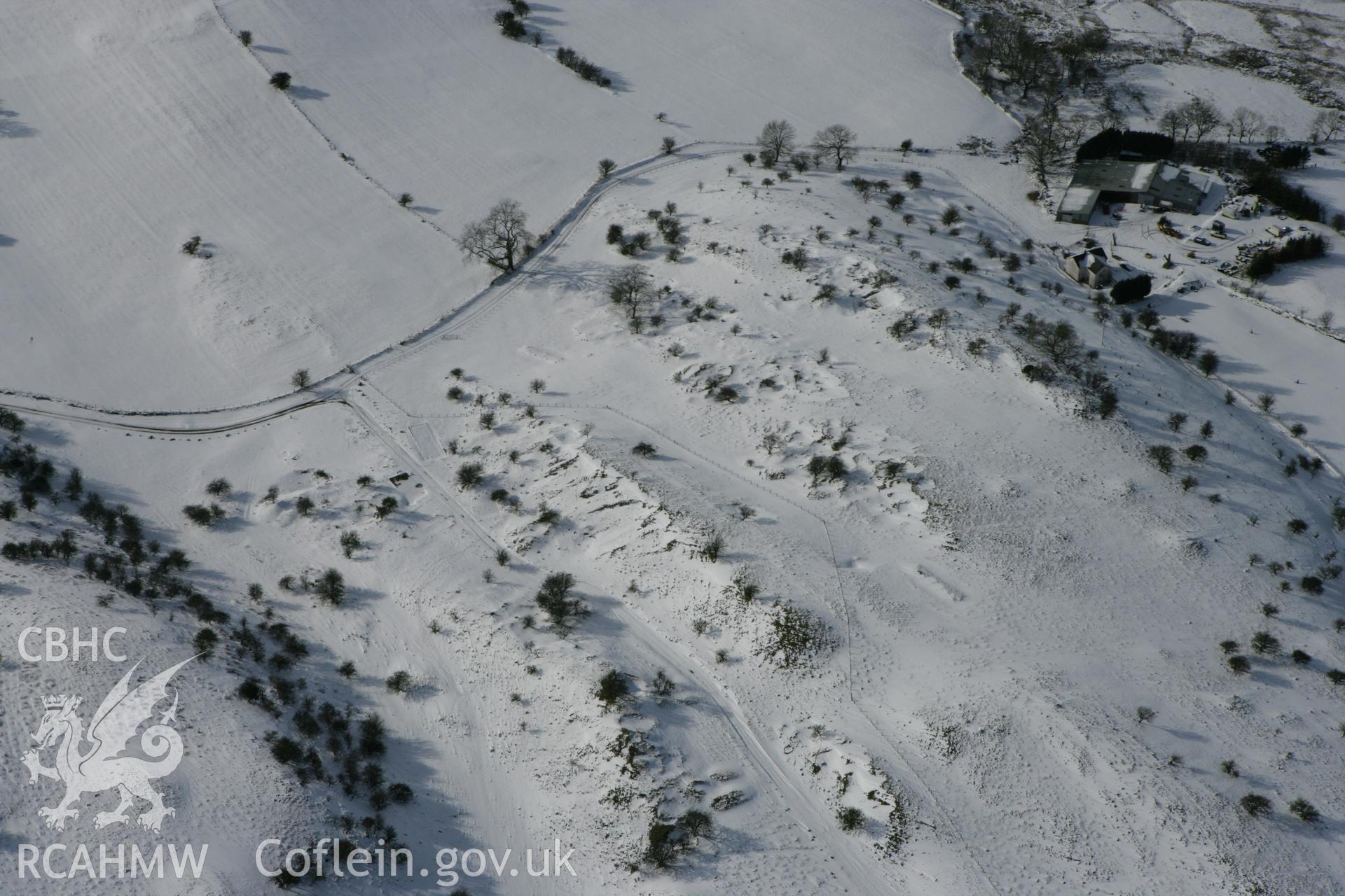 RCAHMW colour oblique photograph of Beddau'r Derwyddon pillow mounds. Taken by Toby Driver on 06/02/2009.