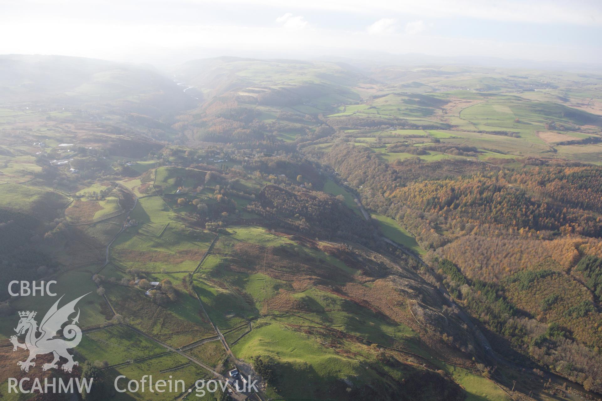 RCAHMW colour oblique aerial photograph of Storehouse Rabbit Warren, Pontrhydygroes, and surrounding landscape. Taken on 09 November 2009 by Toby Driver