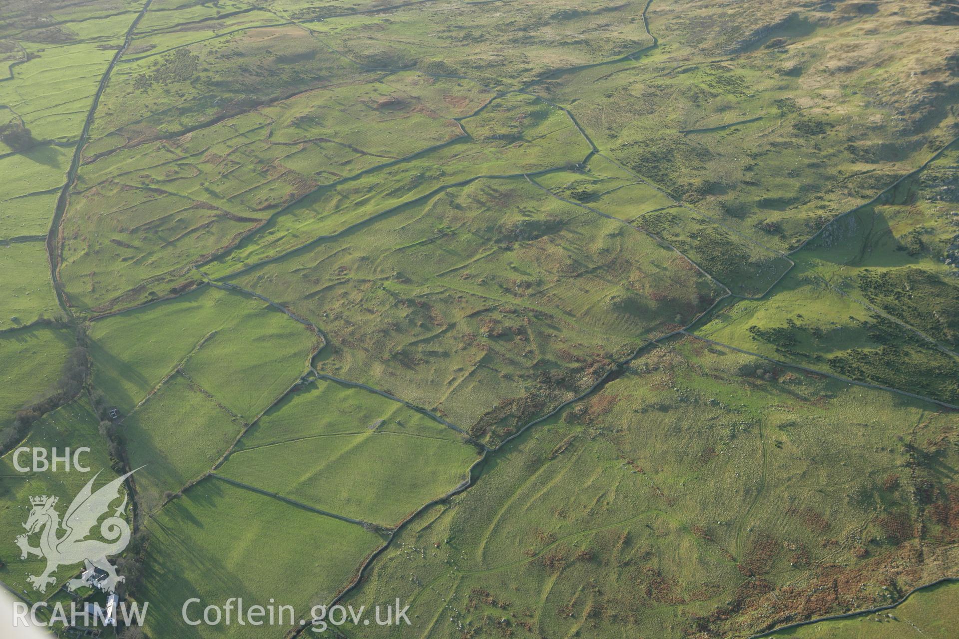 RCAHMW colour oblique aerial photograph of Maen-y-Bardd Settlement and field systems Taken on 10 December 2009 by Toby Driver