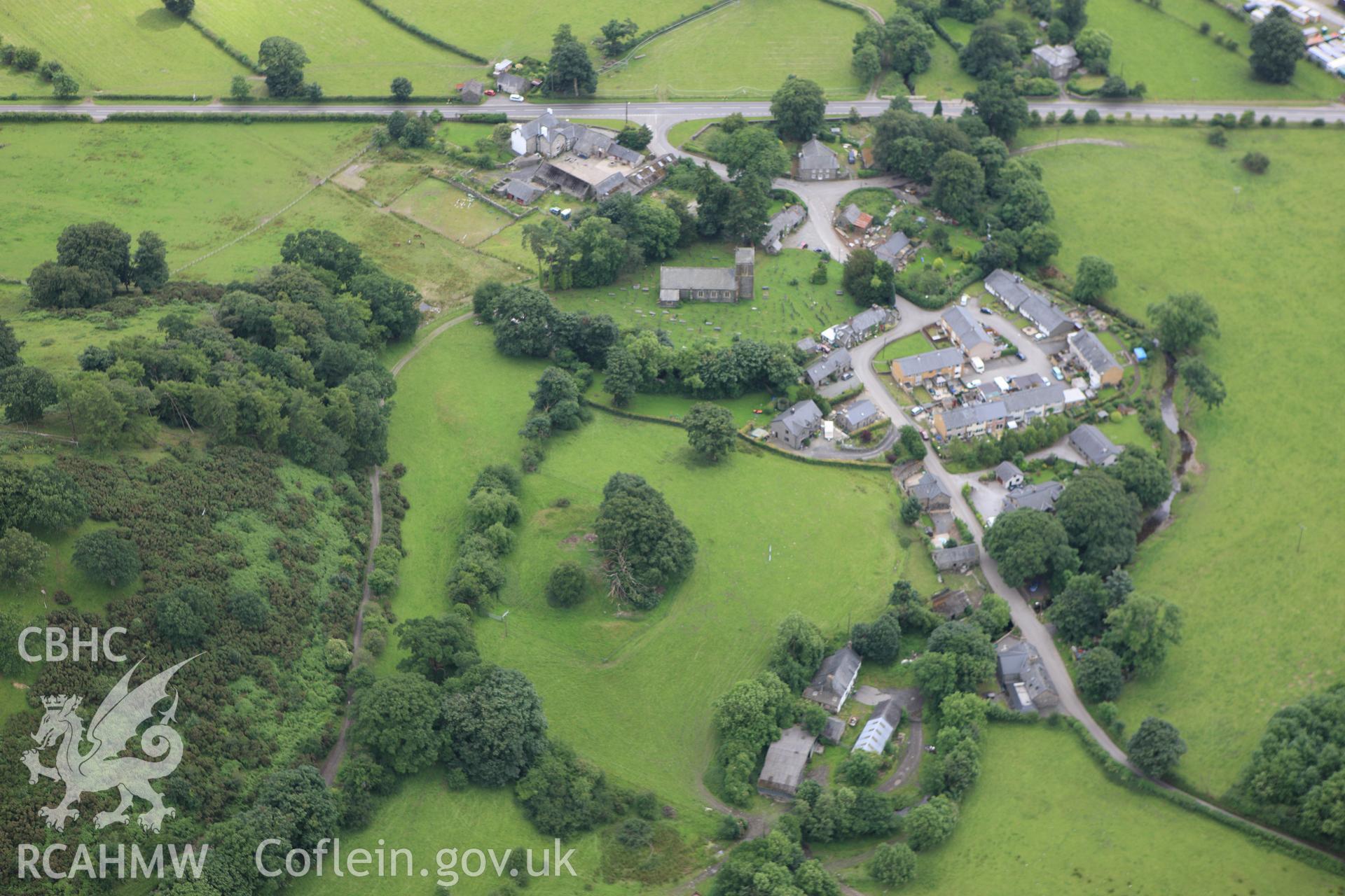 RCAHMW colour oblique aerial photograph of Pen Ucha'r Llan Castle Earthworks. Taken on 08 July 2009 by Toby Driver