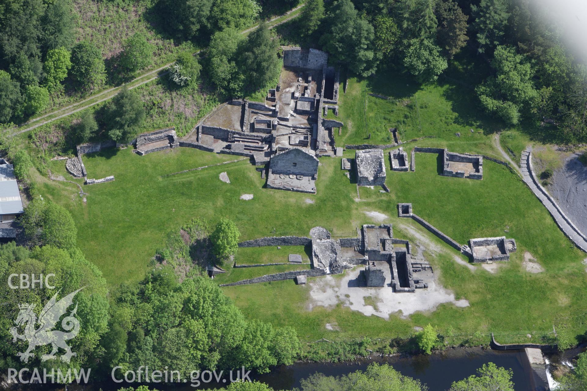 RCAHMW colour oblique aerial photograph of Bryntail Lead Mine. Taken on 02 June 2009 by Toby Driver