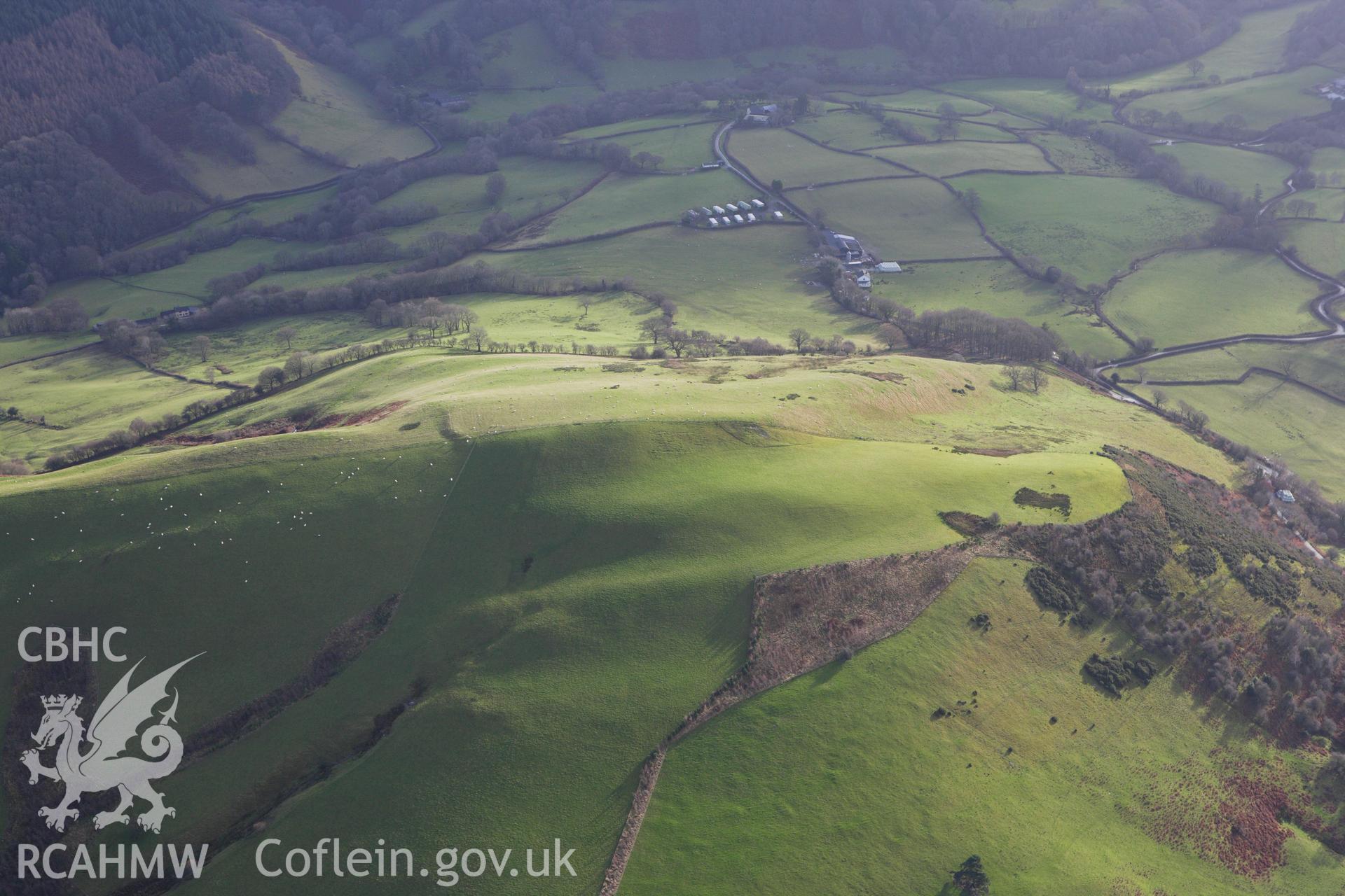 RCAHMW colour oblique aerial photograph of Coed y Gaer. Taken on 10 December 2009 by Toby Driver