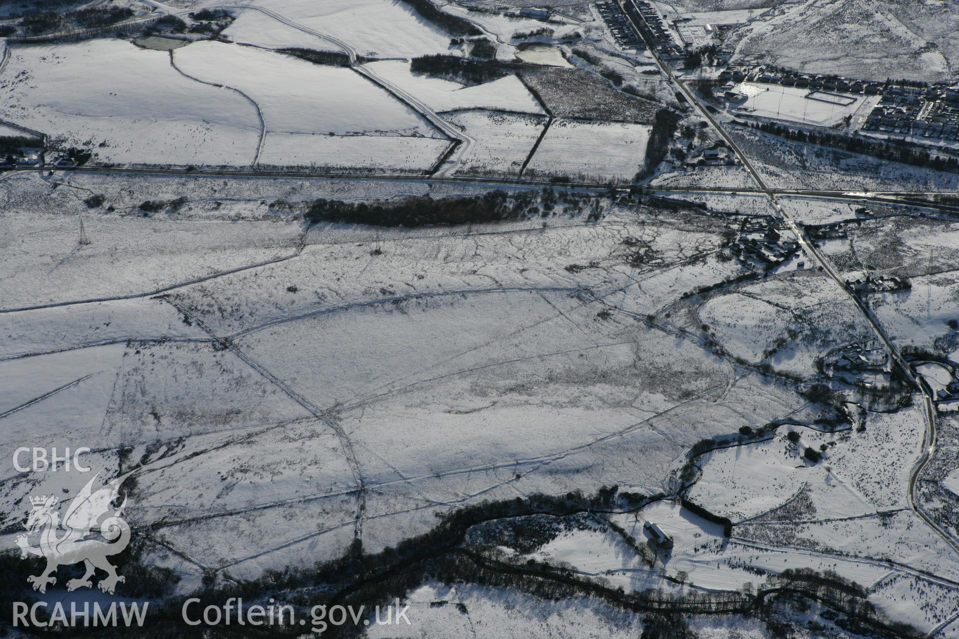 RCAHMW colour oblique photograph of Coelbren Roman marching camp. Taken by Toby Driver on 06/02/2009.