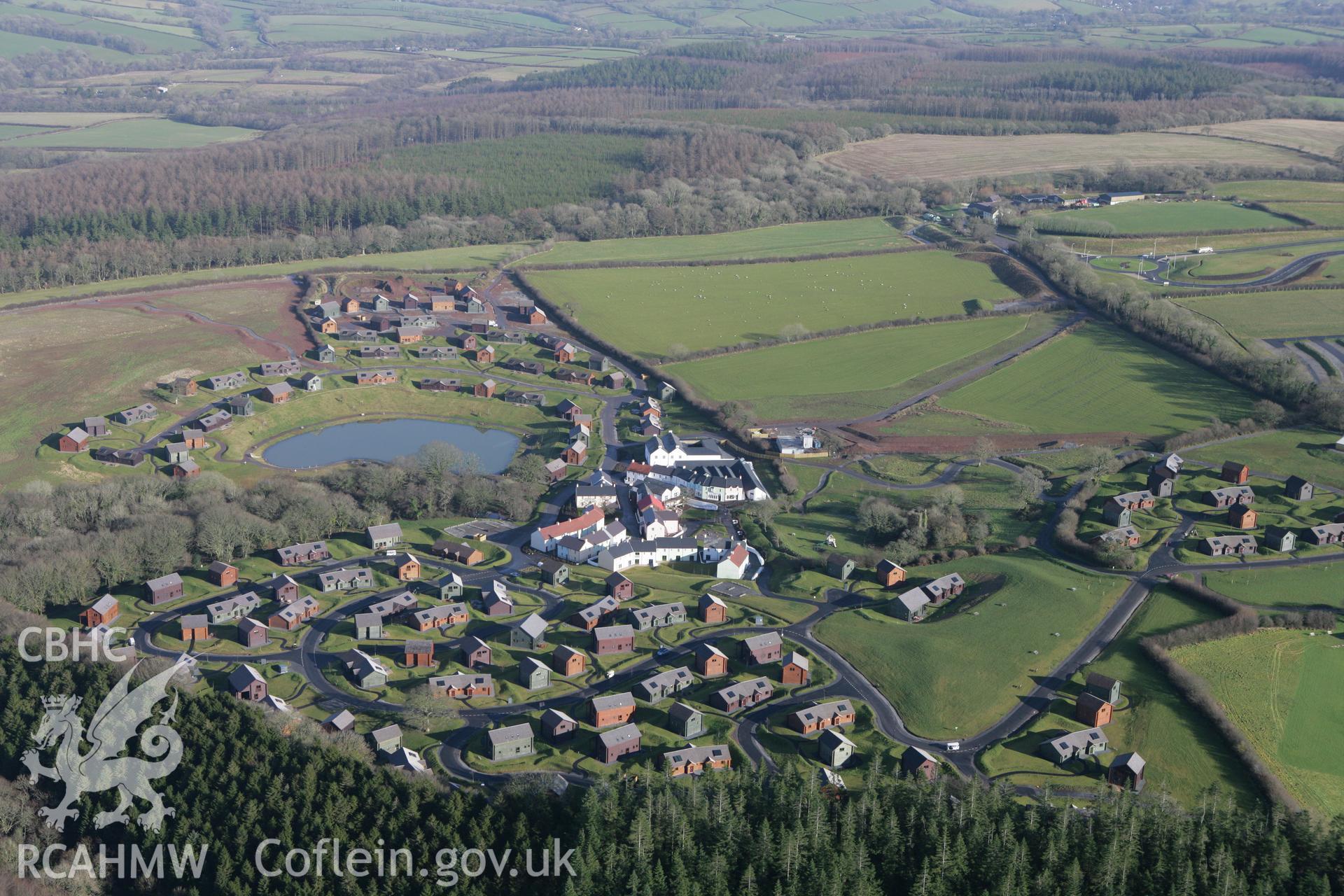 RCAHMW colour oblique aerial photograph of Newton North Church and Bluestone Holiday Village. Taken on 28 January 2009 by Toby Driver