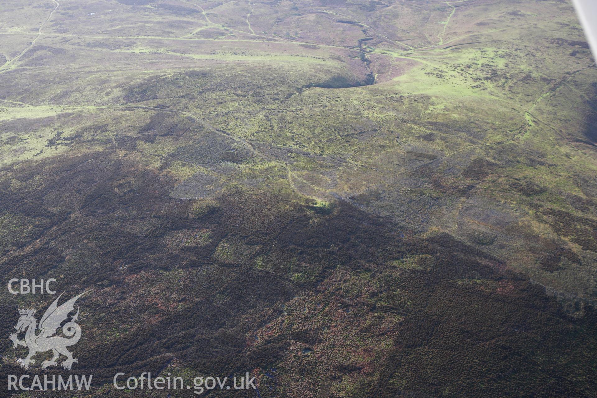 RCAHMW colour oblique aerial photograph of Beacon Hill Barrow II. Taken on 10 December 2009 by Toby Driver