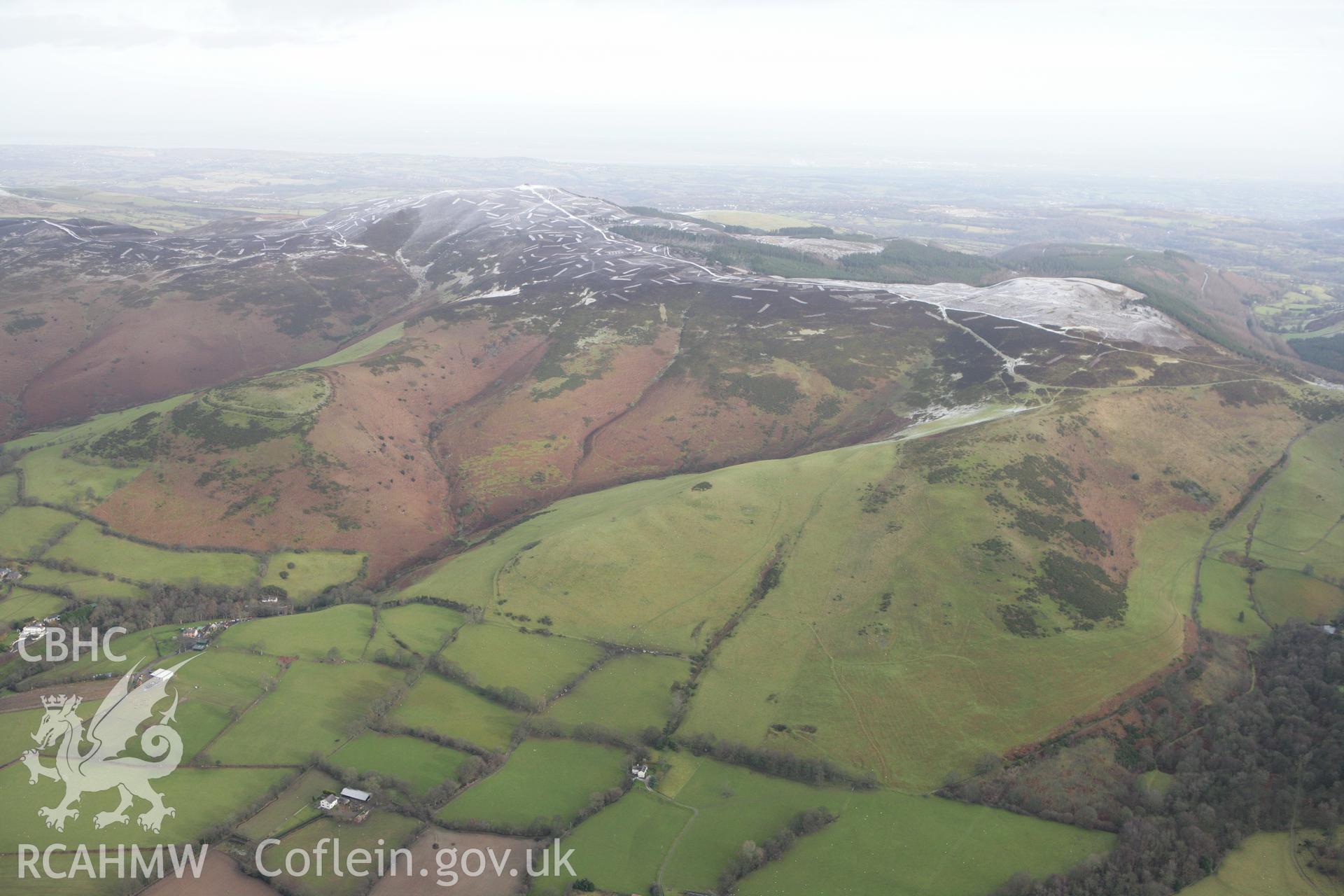 RCAHMW colour oblique photograph of Moel-y-Gaer hillfort, distant winter landscape. Taken by Toby Driver on 21/01/2009.