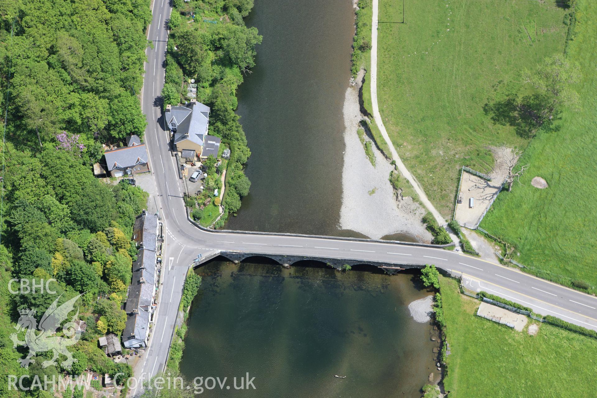 RCAHMW colour oblique aerial photograph of Machynlleth Bridge, (Pont ar Dyfi). Taken on 02 June 2009 by Toby Driver