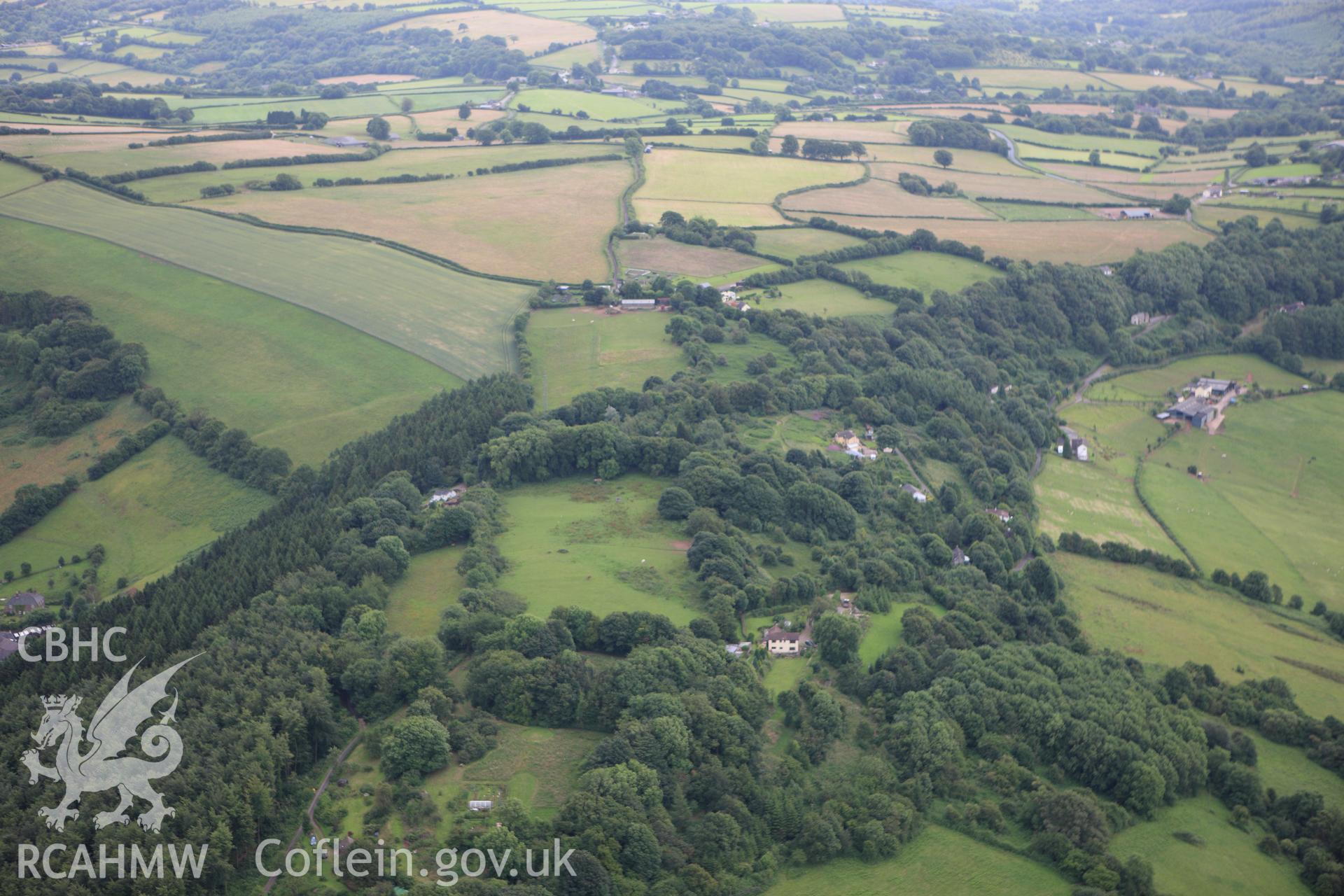 RCAHMW colour oblique aerial photograph of Gaer-Fawr Hillfort. Taken on 09 July 2009 by Toby Driver