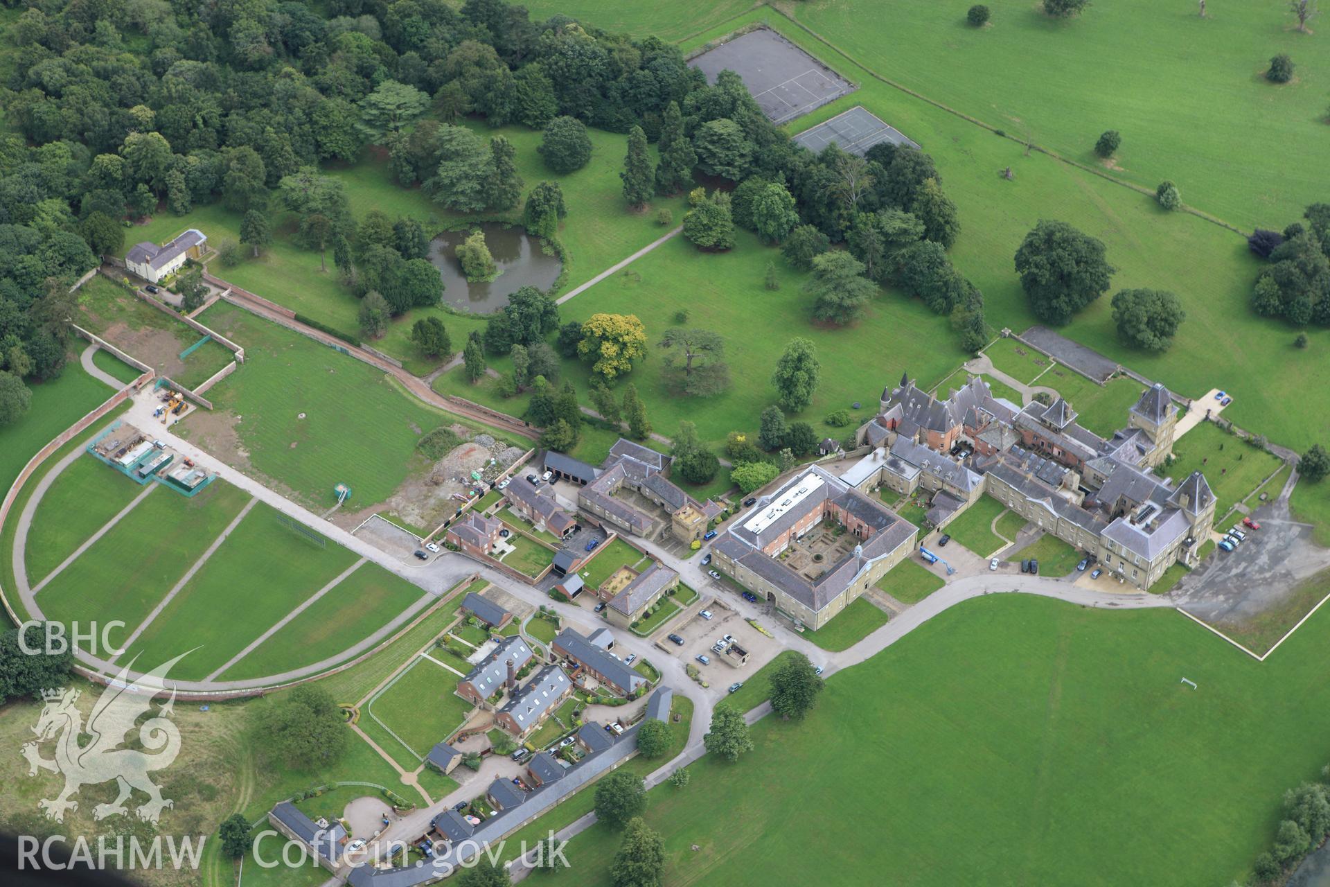 RCAHMW colour oblique aerial photograph of Wynnstay Park Mansion. Taken on 08 July 2009 by Toby Driver