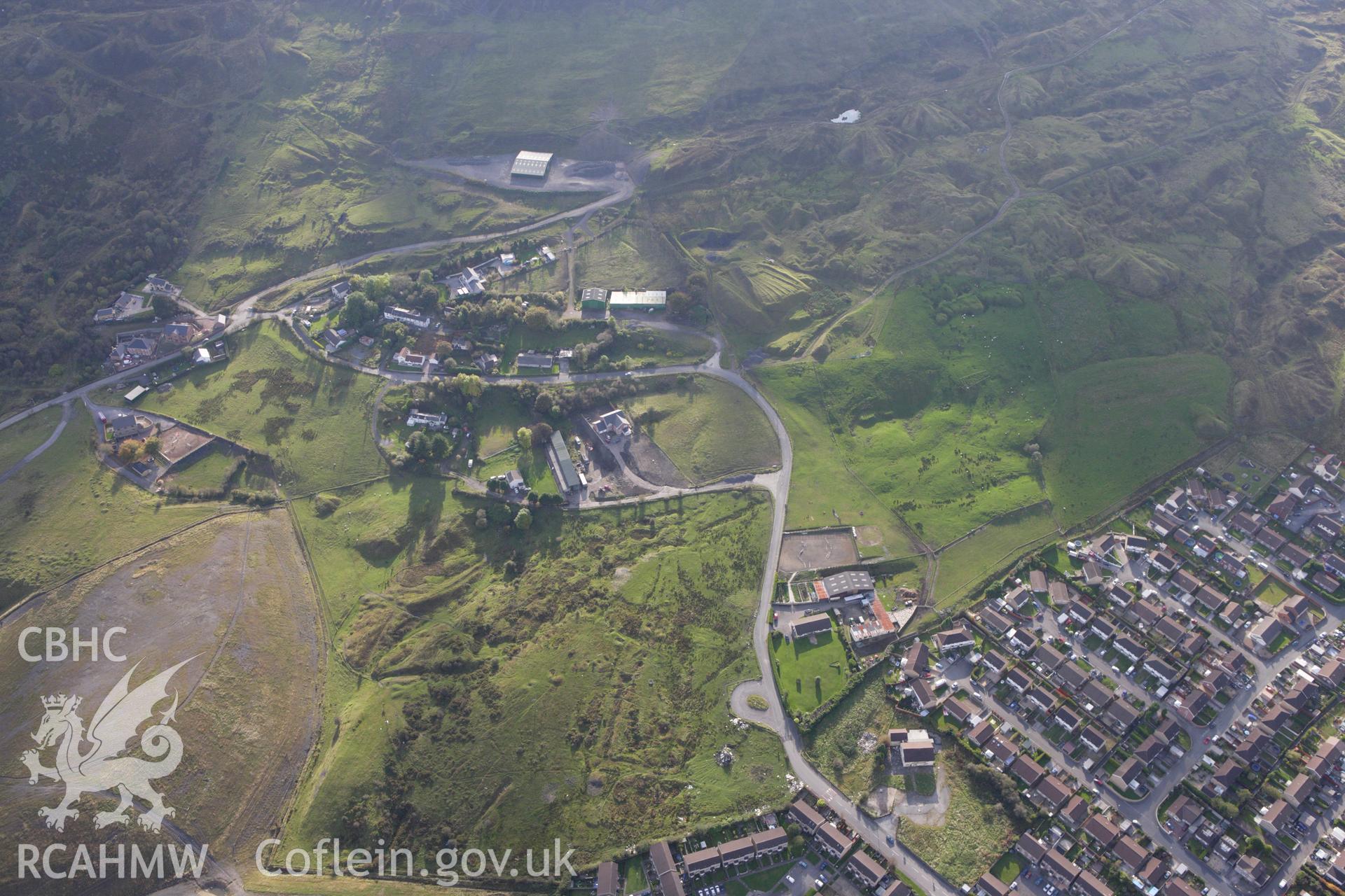 RCAHMW colour oblique aerial photograph of ironstone workings west of Ochr-y-Mynydd. Taken on 14 October 2009 by Toby Driver