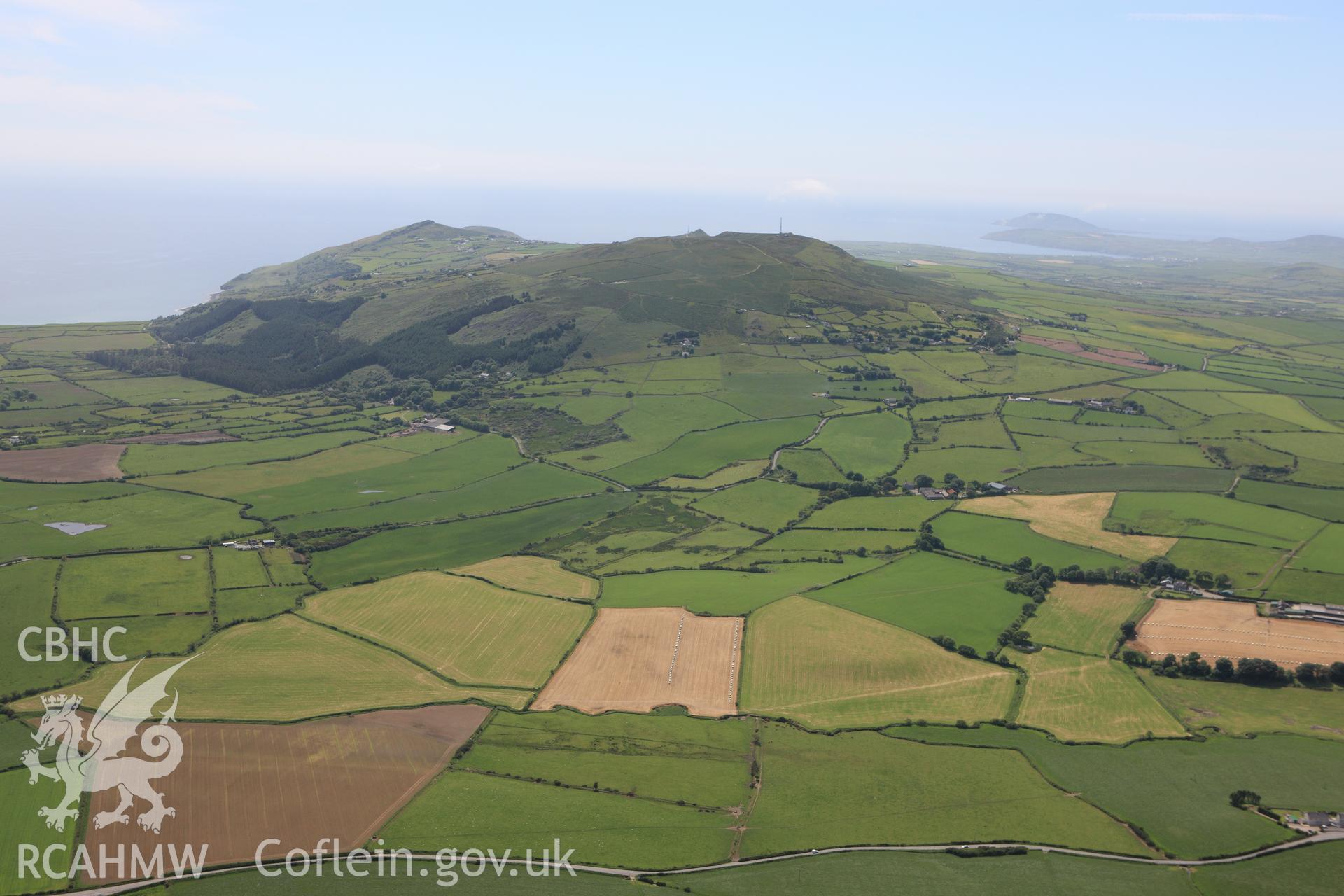 RCAHMW colour oblique aerial photograph showing landscape view of Mynydd Rhiw, viewed from the north-west. Taken on 16 June 2009 by Toby Driver