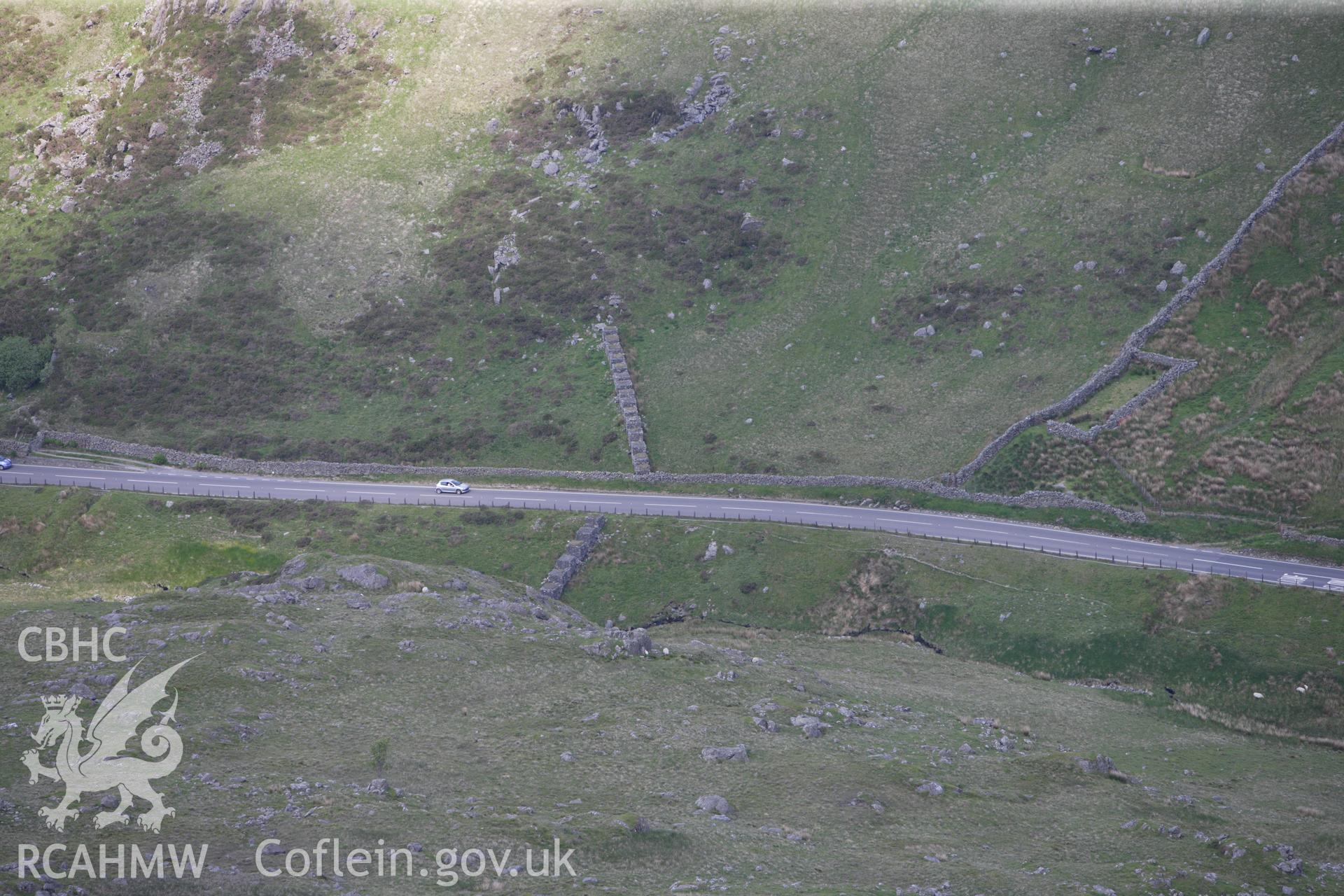 RCAHMW colour oblique aerial photograph of Cube at Brithdir and Islaw'rdre. Taken on 02 June 2009 by Toby Driver