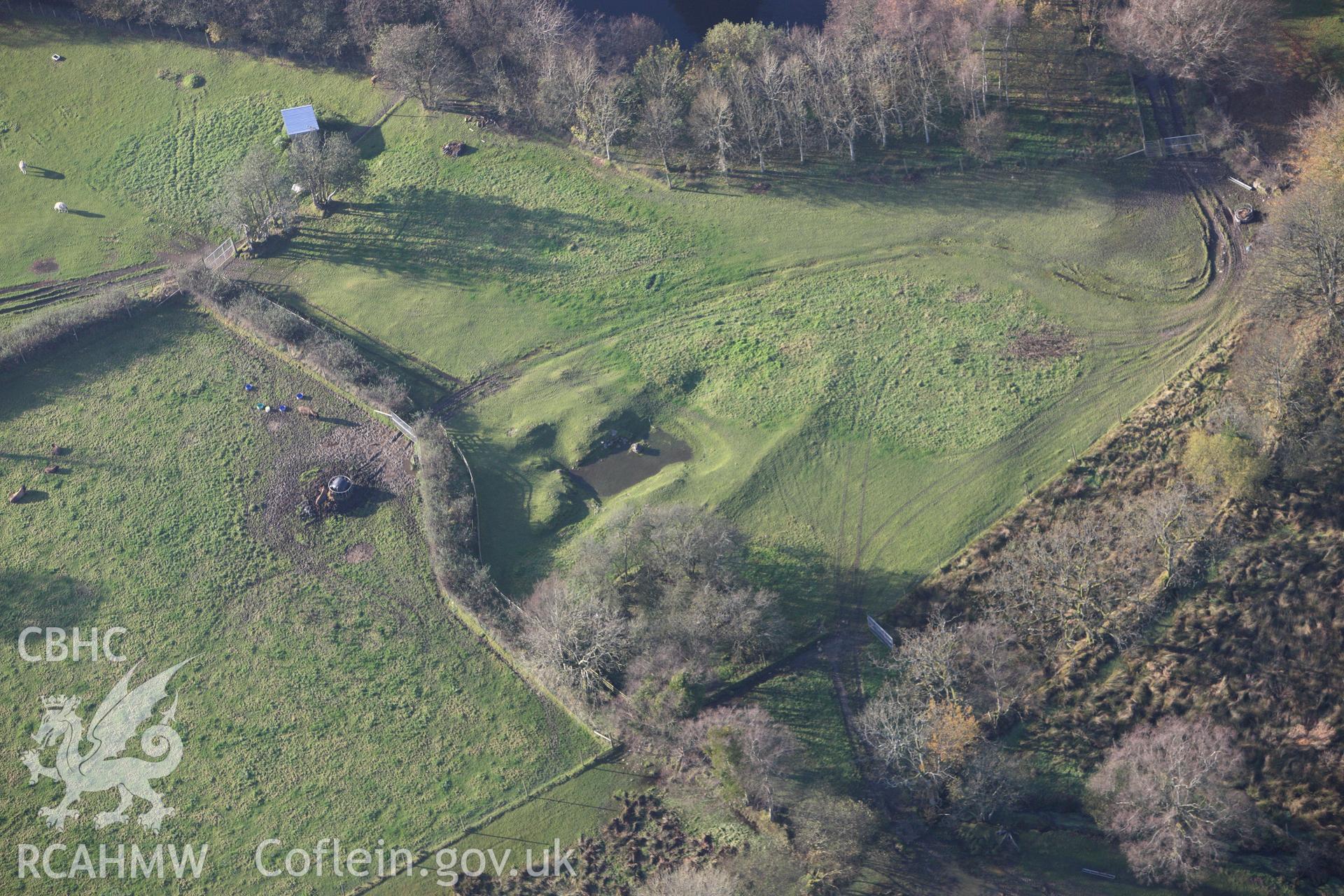 RCAHMW colour oblique aerial photograph of Llanio Roman Bathhouse. Taken on 09 November 2009 by Toby Driver