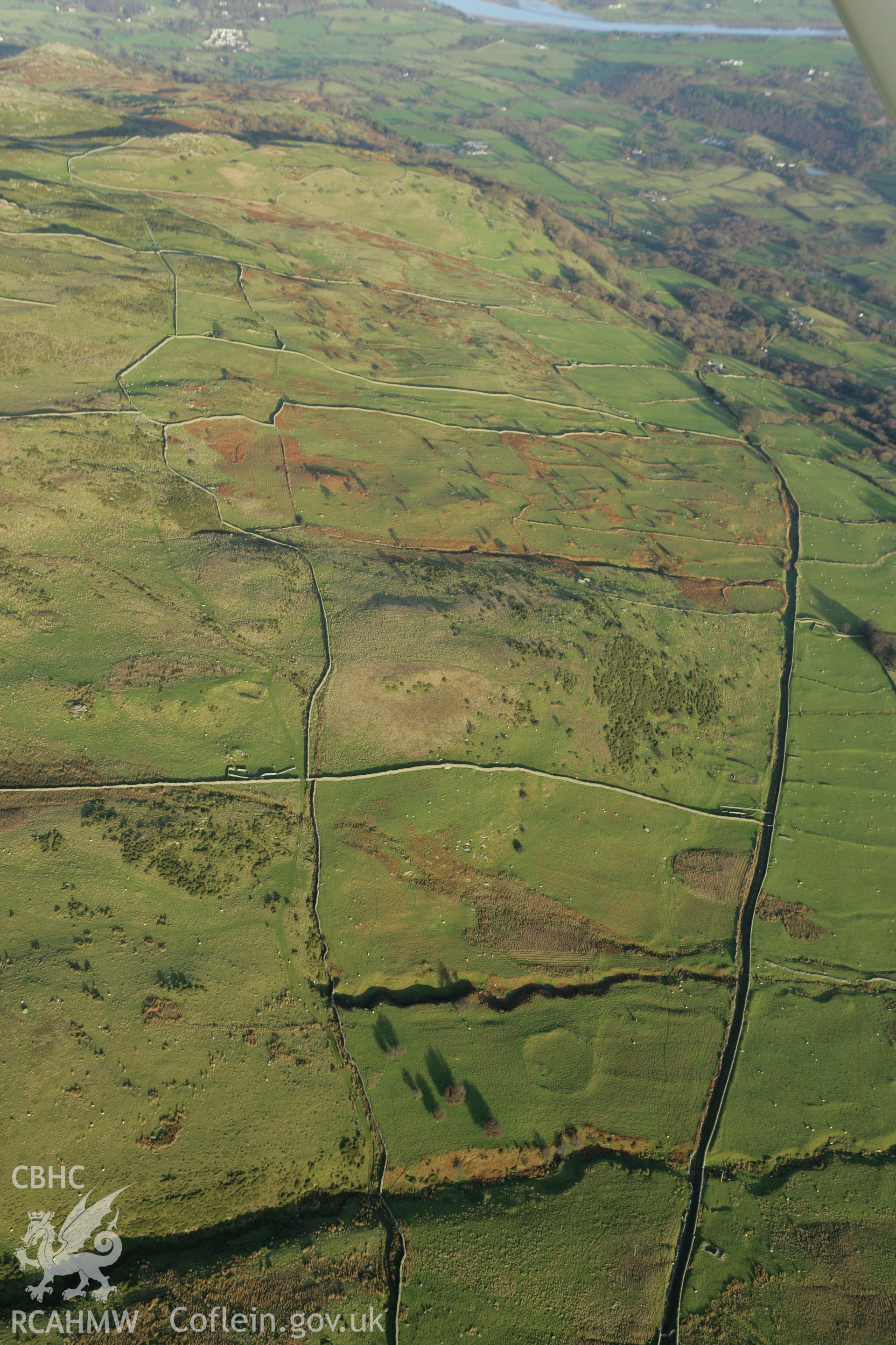 RCAHMW colour oblique aerial photograph of a homestead near Maen-y-Bardd. Taken on 10 December 2009 by Toby Driver