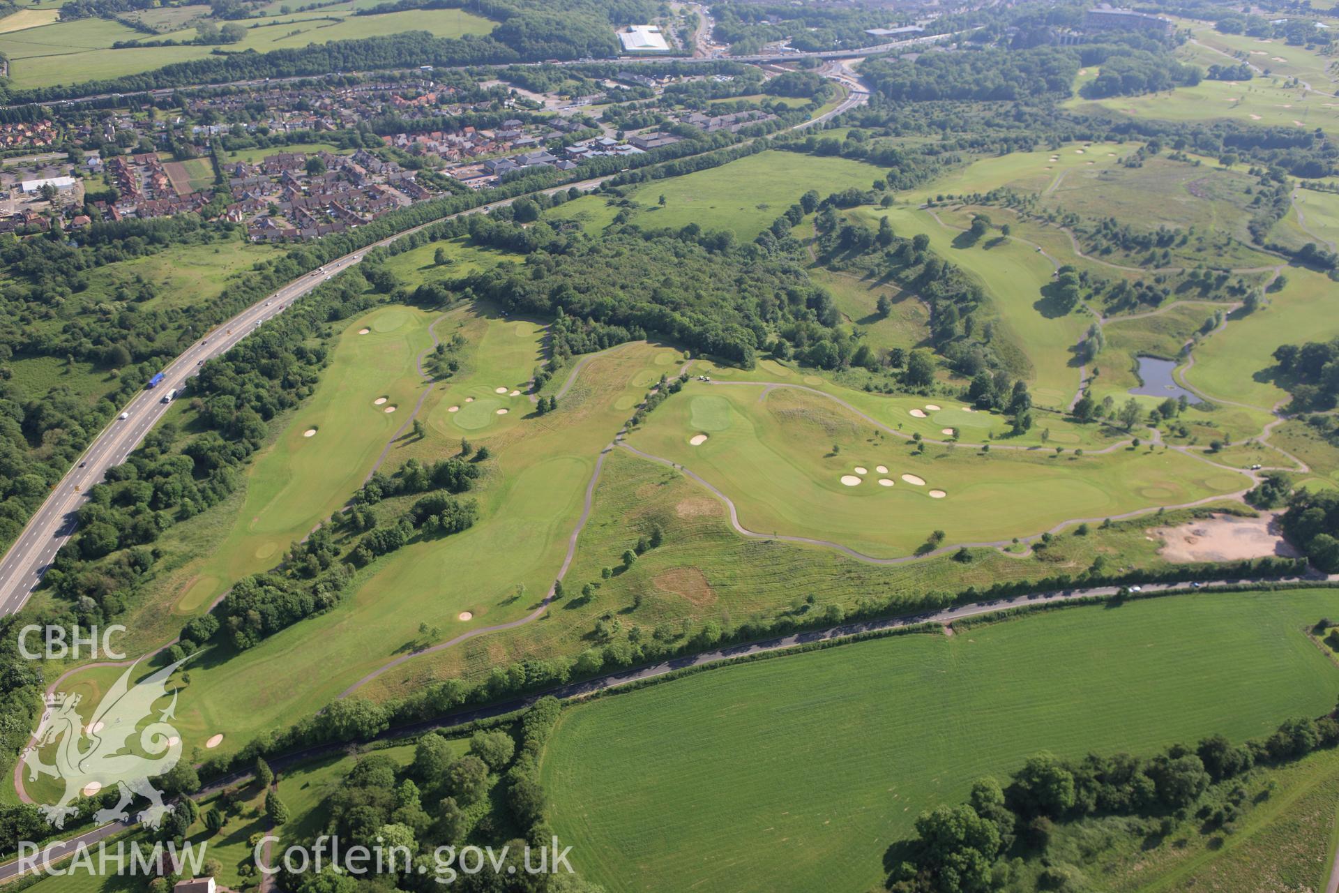 RCAHMW colour oblique aerial photograph of Celtic Manor Golf Club, Caerleon. Taken on 11 June 2009 by Toby Driver