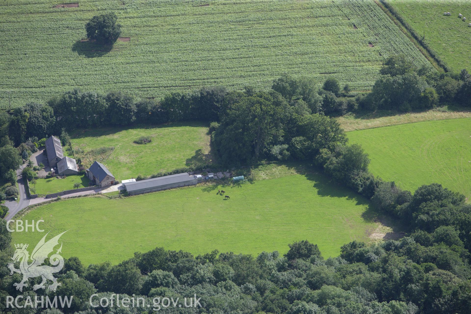 RCAHMW colour oblique aerial photograph of Maes Celyn Motte, Maescelyn Castle Taken on 23 July 2009 by Toby Driver