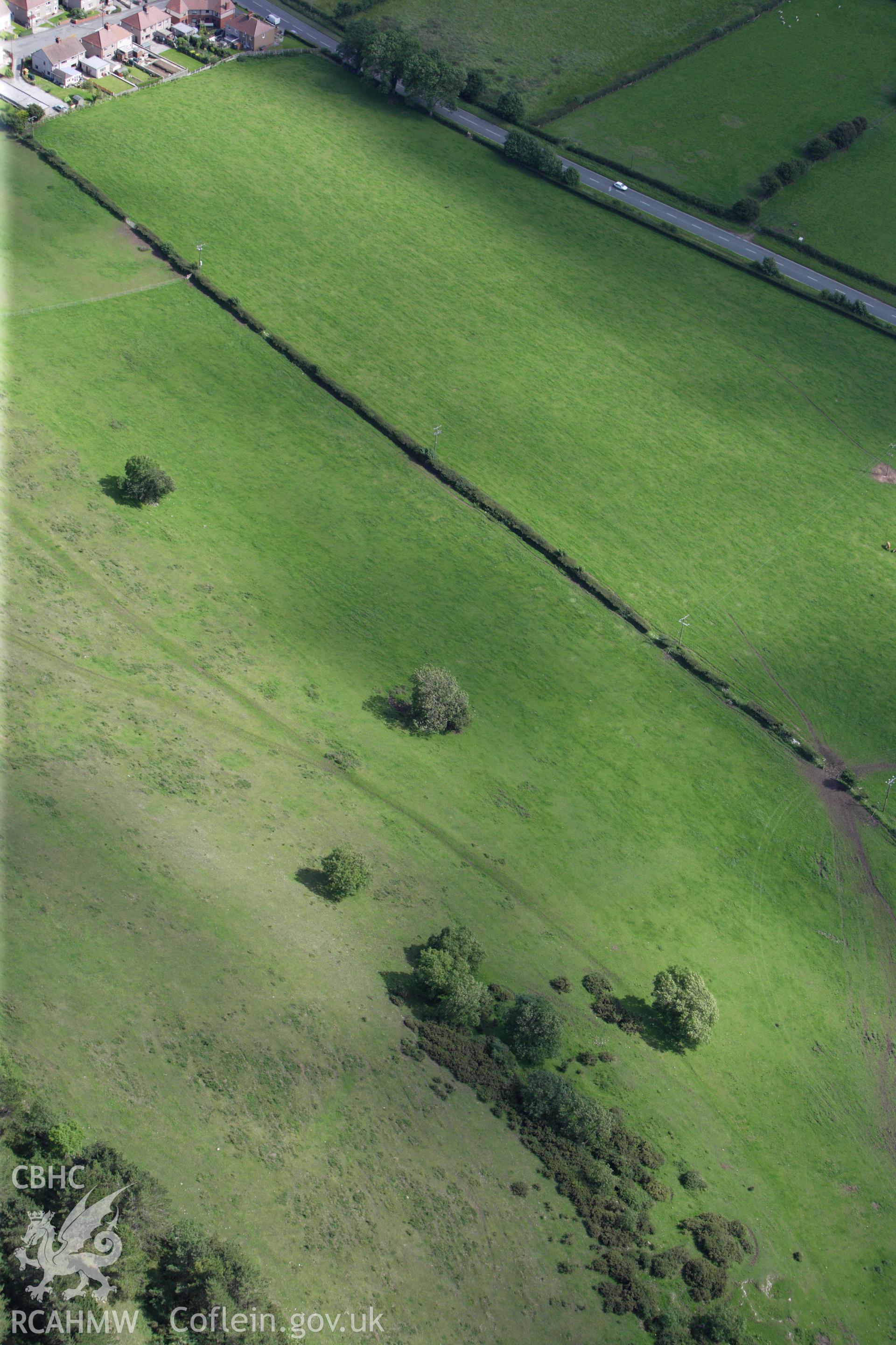 RCAHMW colour oblique aerial photograph of a section of Offa's Dyke or Whitford Dyke southeast of Gop Farm. Taken on 30 July 2009 by Toby Driver