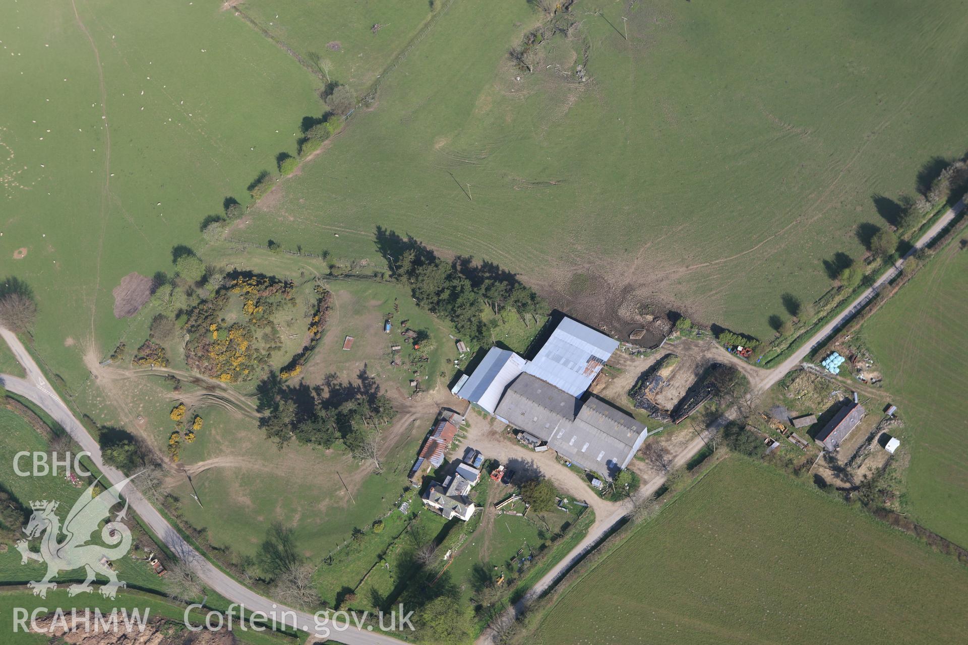 RCAHMW colour oblique aerial photograph of Bishop's Moat. Taken on 21 April 2009 by Toby Driver