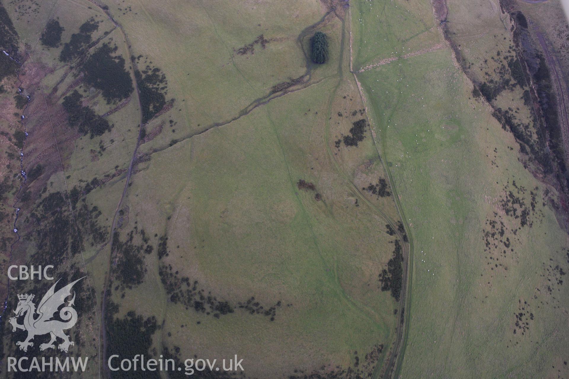 RCAHMW colour oblique aerial photograph of Crugyn-Llwyd Cairn. Taken on 10 December 2009 by Toby Driver