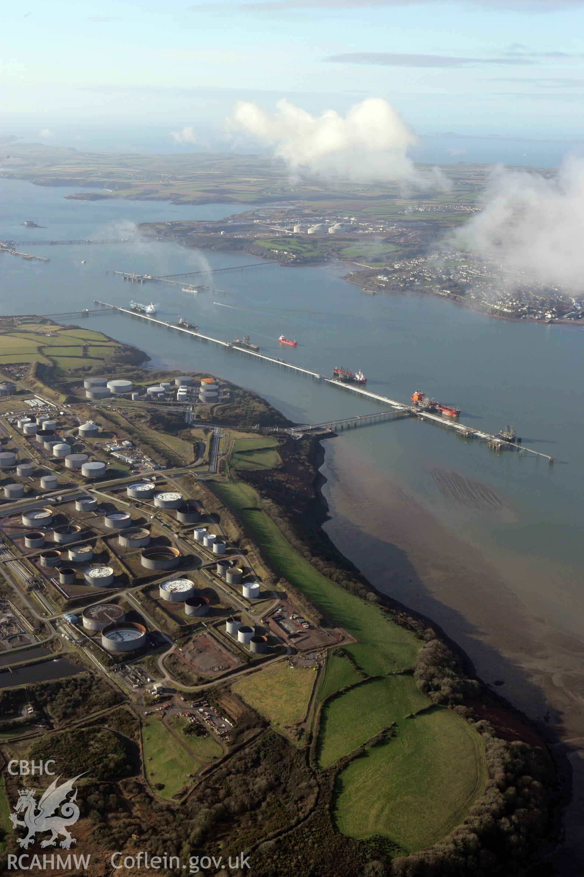 RCAHMW colour oblique photograph of Rhoscrowther oil refinery and storage facility. Taken by Toby Driver on 11/02/2009.