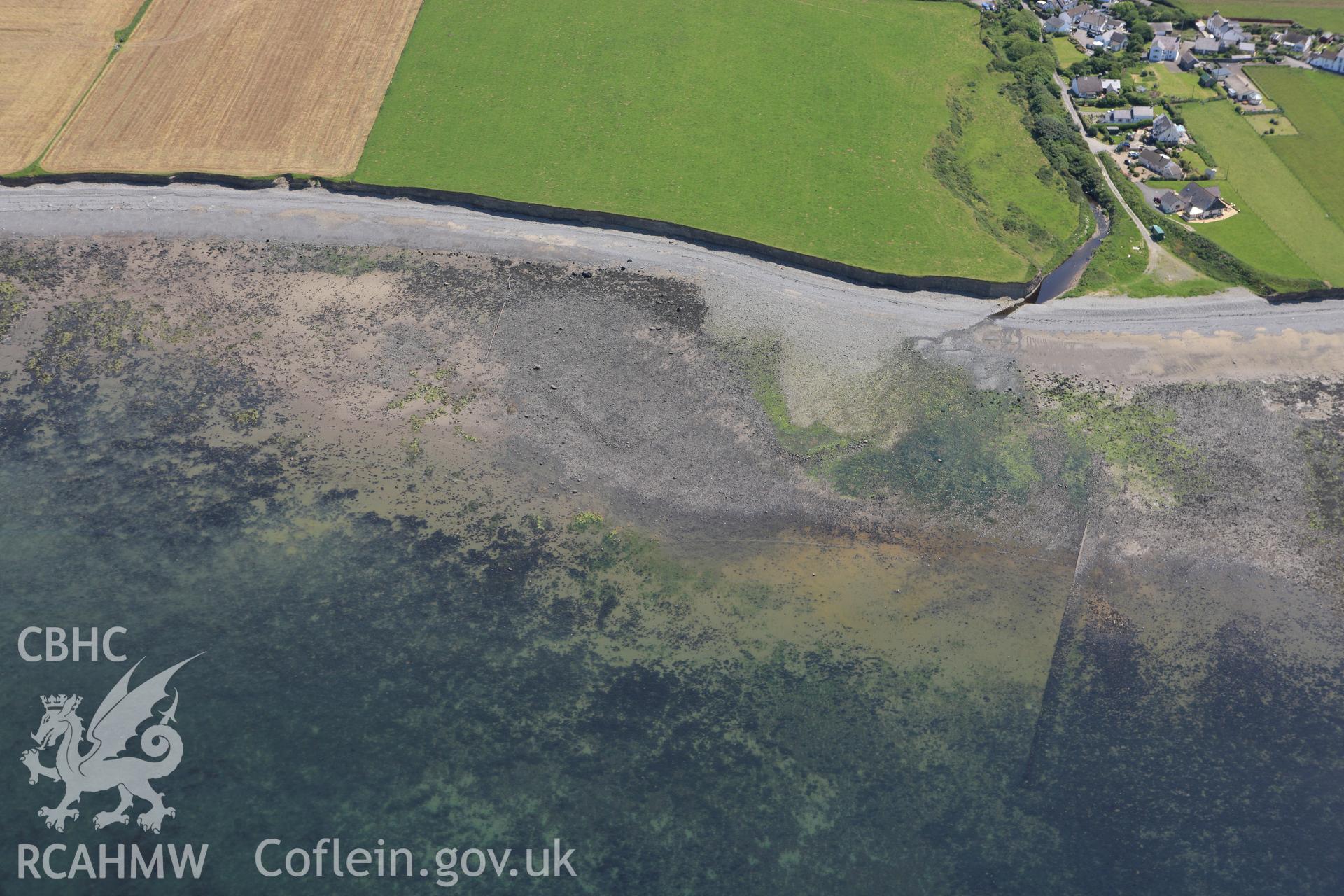 RCAHMW colour oblique aerial photograph of Craiglas Fish Traps, Llanon. Taken on 02 June 2009 by Toby Driver