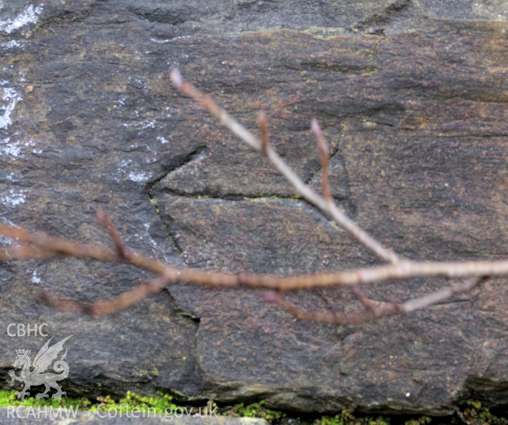 Colour photo showing mason's marks on the stone piers of the viaduct, taken by Mark Evans, January 2017.